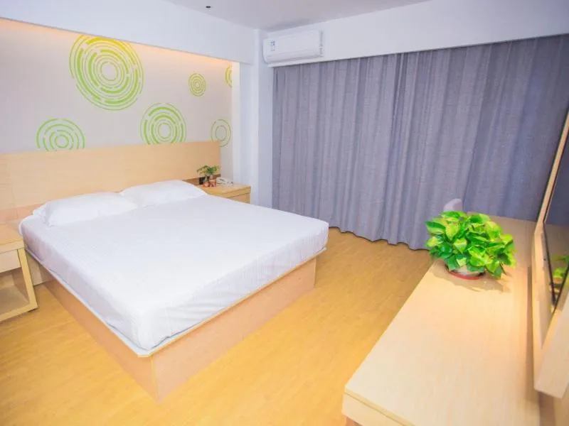 Bed in GreenTree Inn Yangzhou Jiangdu Xiaoji Town South Zhongxing Road Express Hotel
