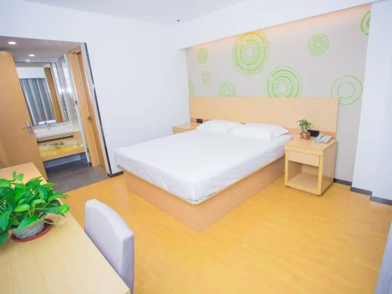 Bed in GreenTree Inn Yangzhou Jiangdu Xiaoji Town South Zhongxing Road Express Hotel