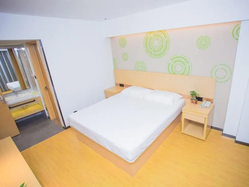 Bed in GreenTree Inn Yangzhou Jiangdu Xiaoji Town South Zhongxing Road Express Hotel