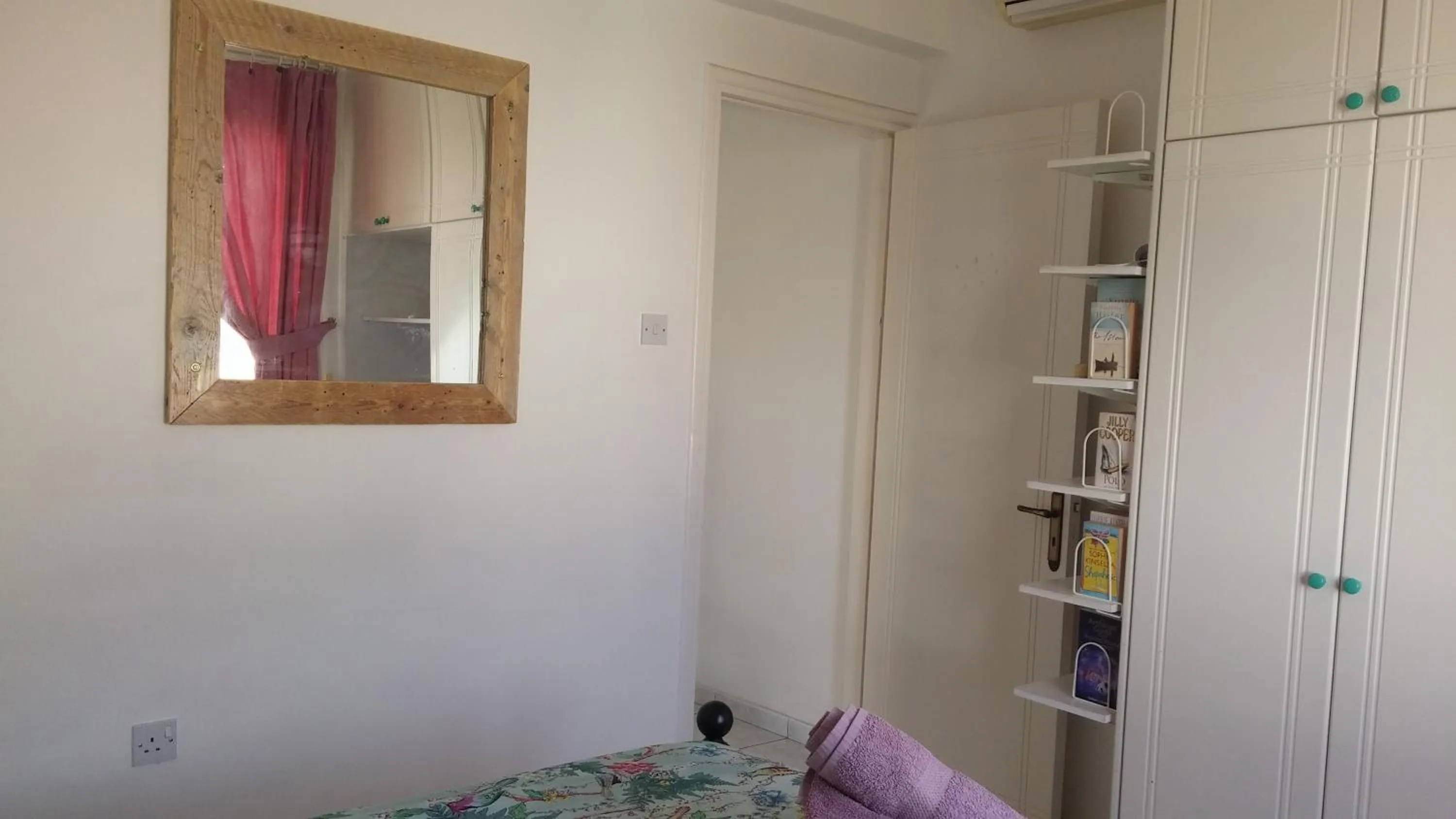 Decorative detail, Bed in Athena and The Owl Beachside Apt