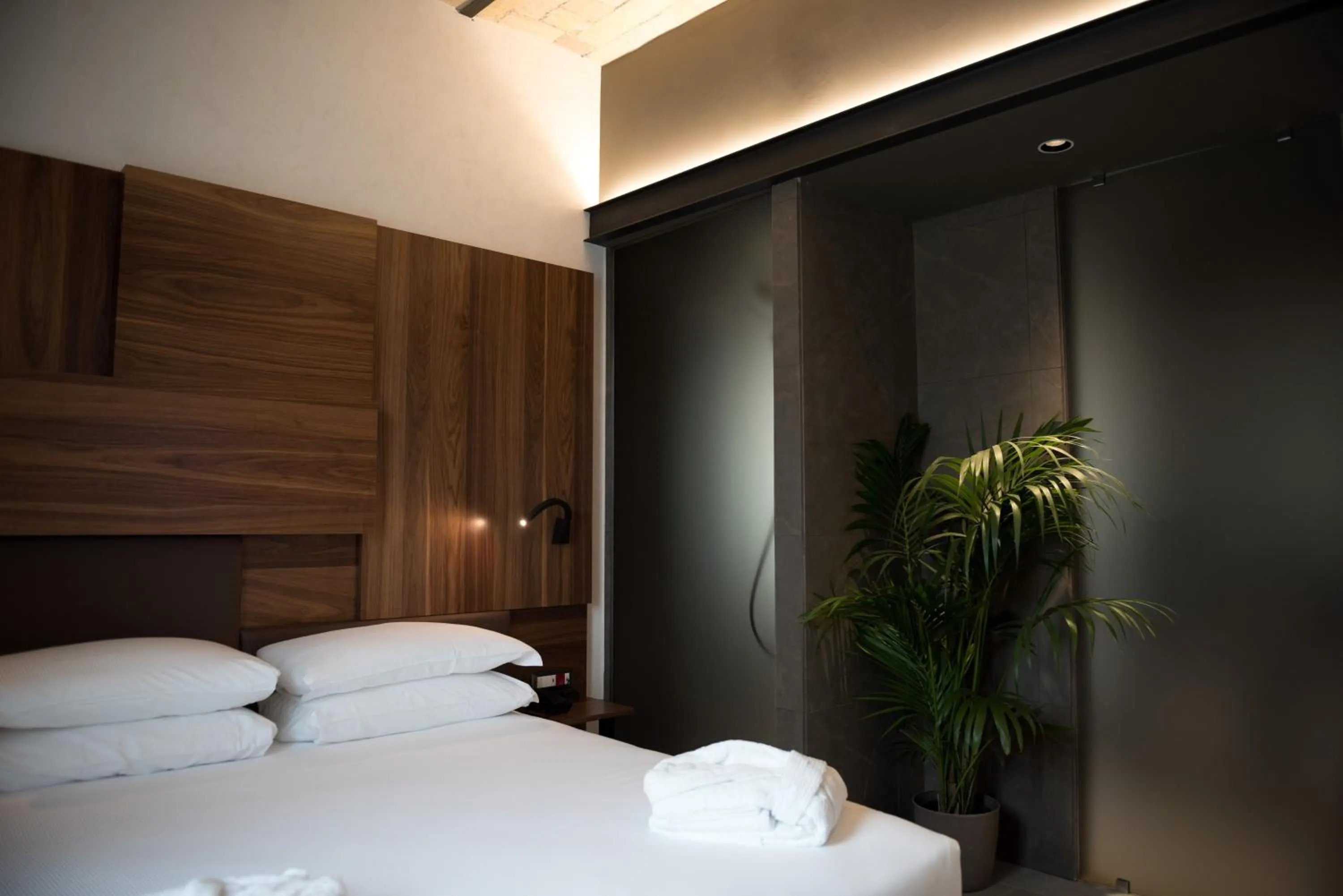 Bed in Gasometer Urban Suites