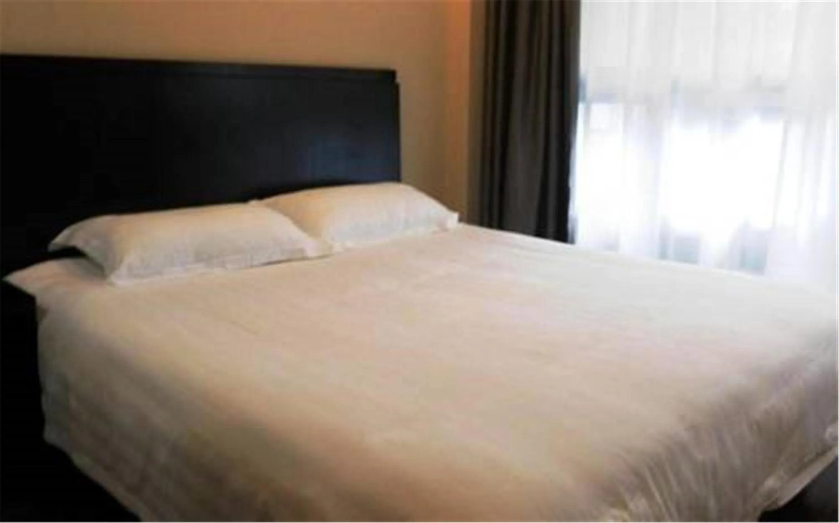 Bed in Hundred Centuries Hotel