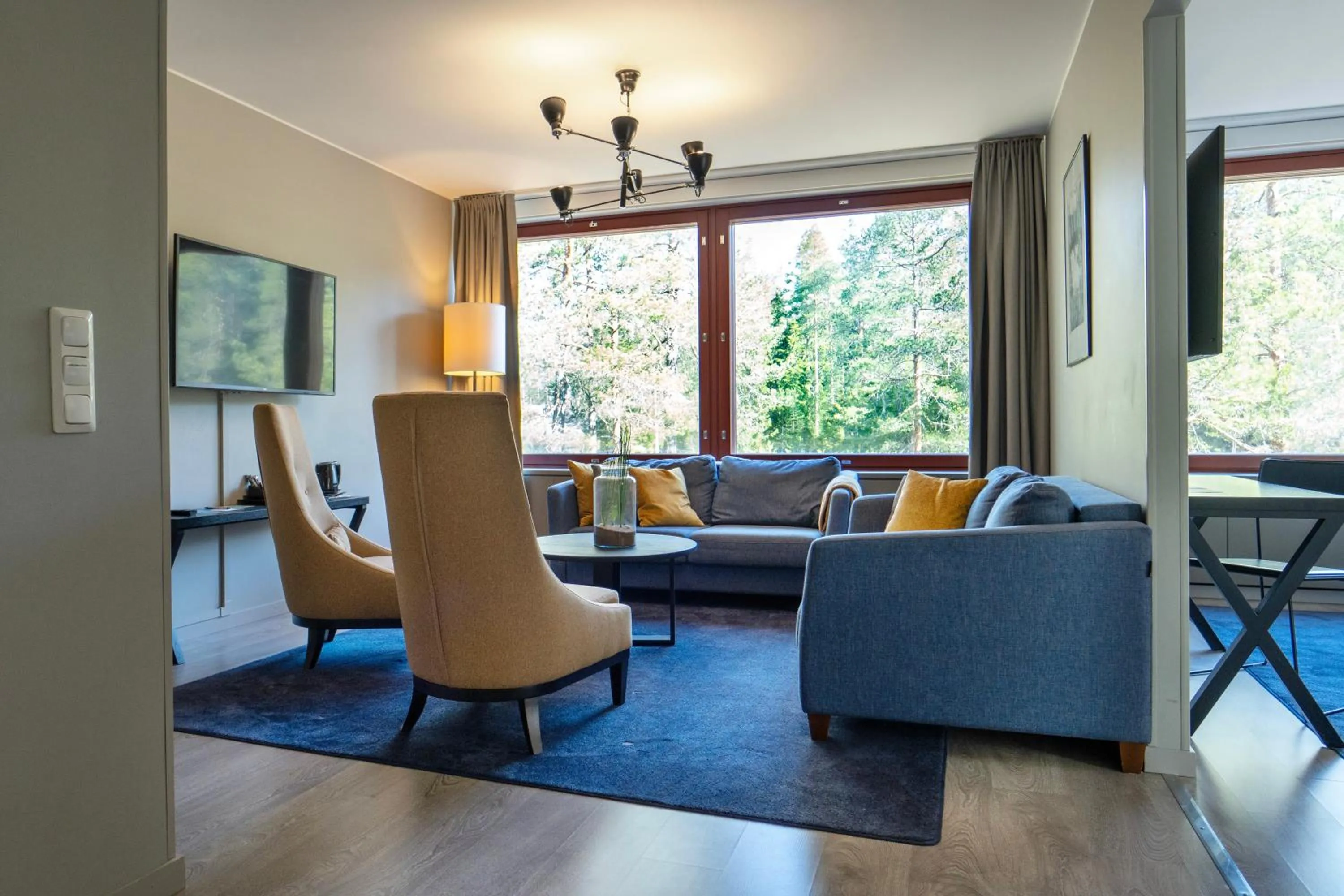 Communal lounge/ TV room in Hotel Korpilampi