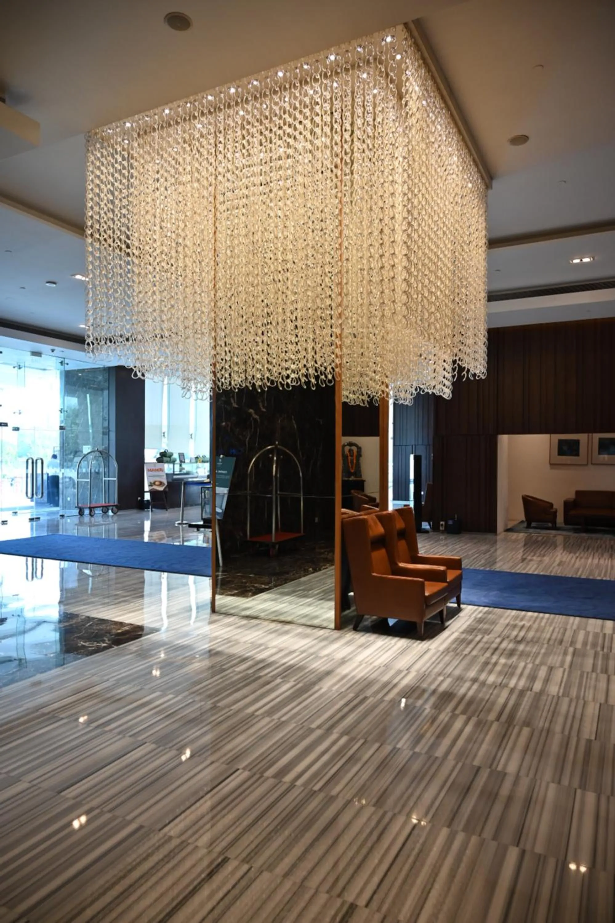 Lobby or reception in Holiday Inn New Delhi Mayur Vihar Noida by IHG