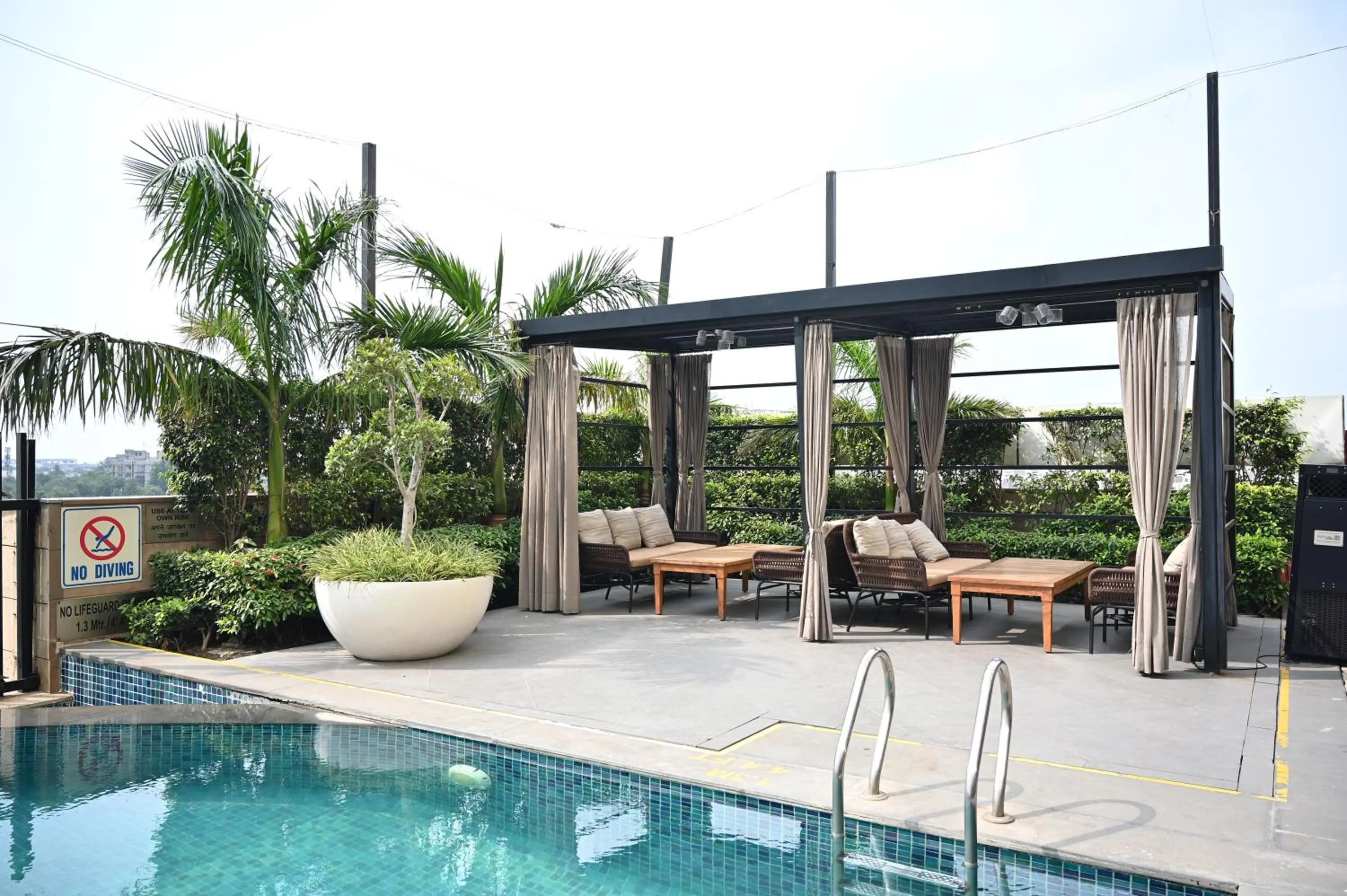 Swimming pool in Holiday Inn New Delhi Mayur Vihar Noida by IHG