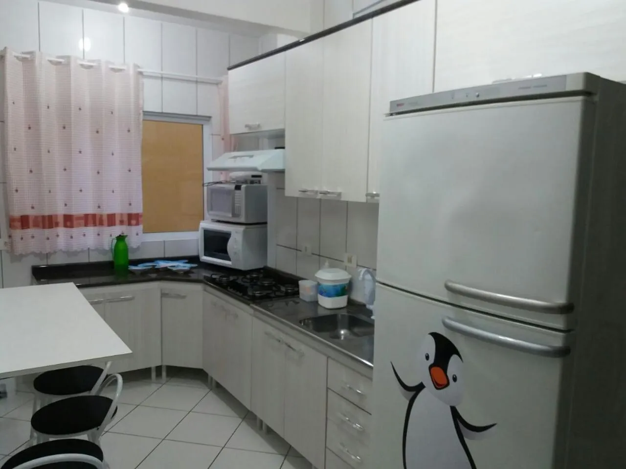 Kitchen or kitchenette in Apartamento Guaratuba