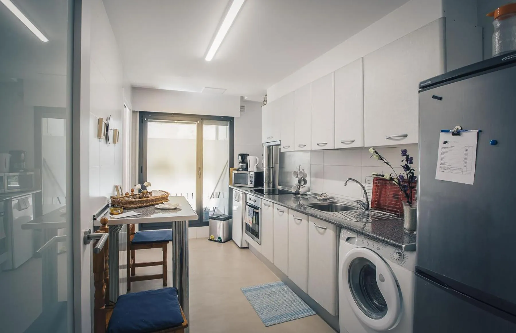 Kitchen or kitchenette in Casa Ferran, amplias habitaciones y apartamentos de montaña