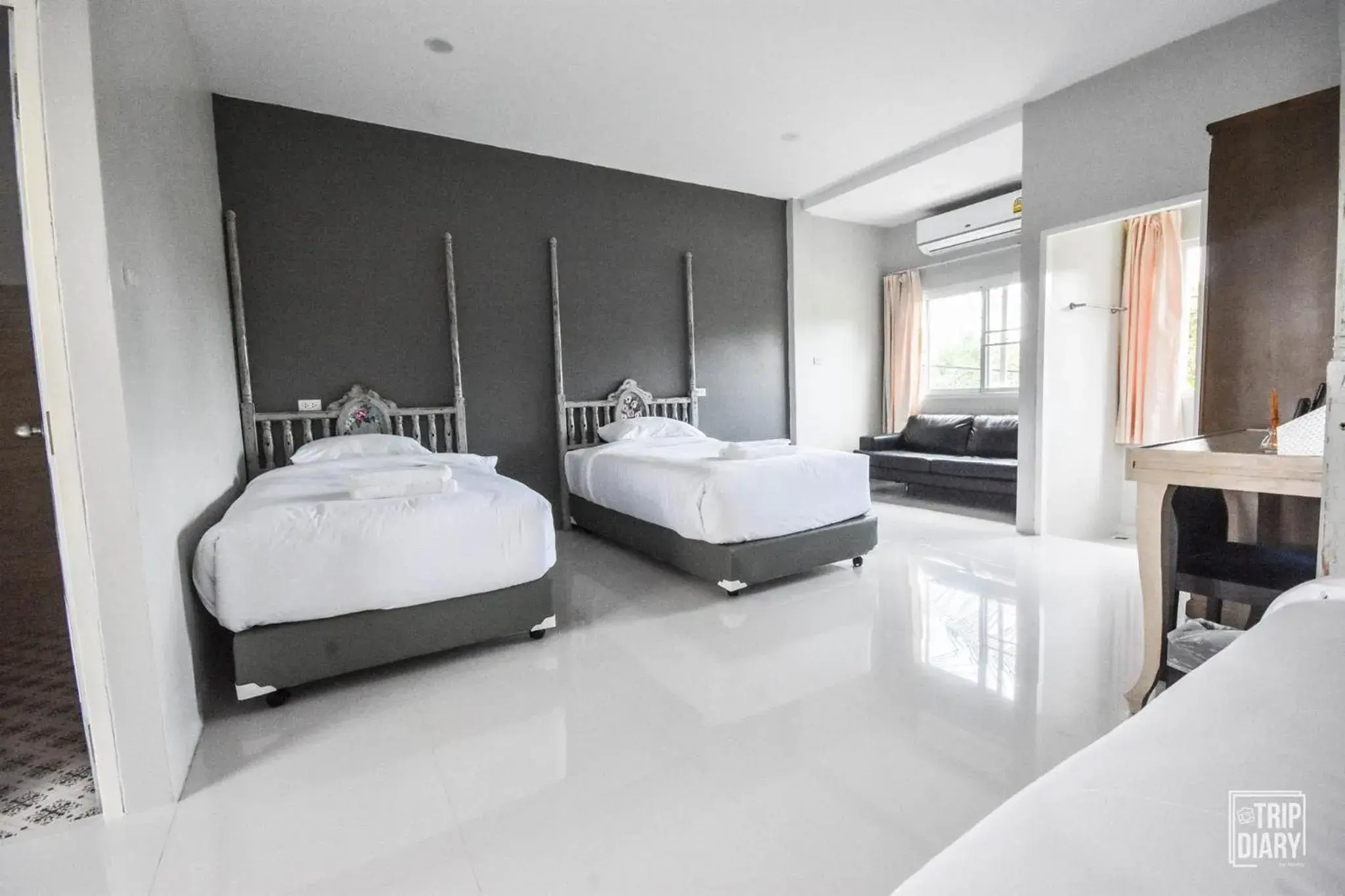 Deluxe Quadruple Room in Phuket Nonnita Boutique Resort - SHA Plus Deluxe Quadruple Room in Phuket Nonnita Boutique Resort - SHA Plus