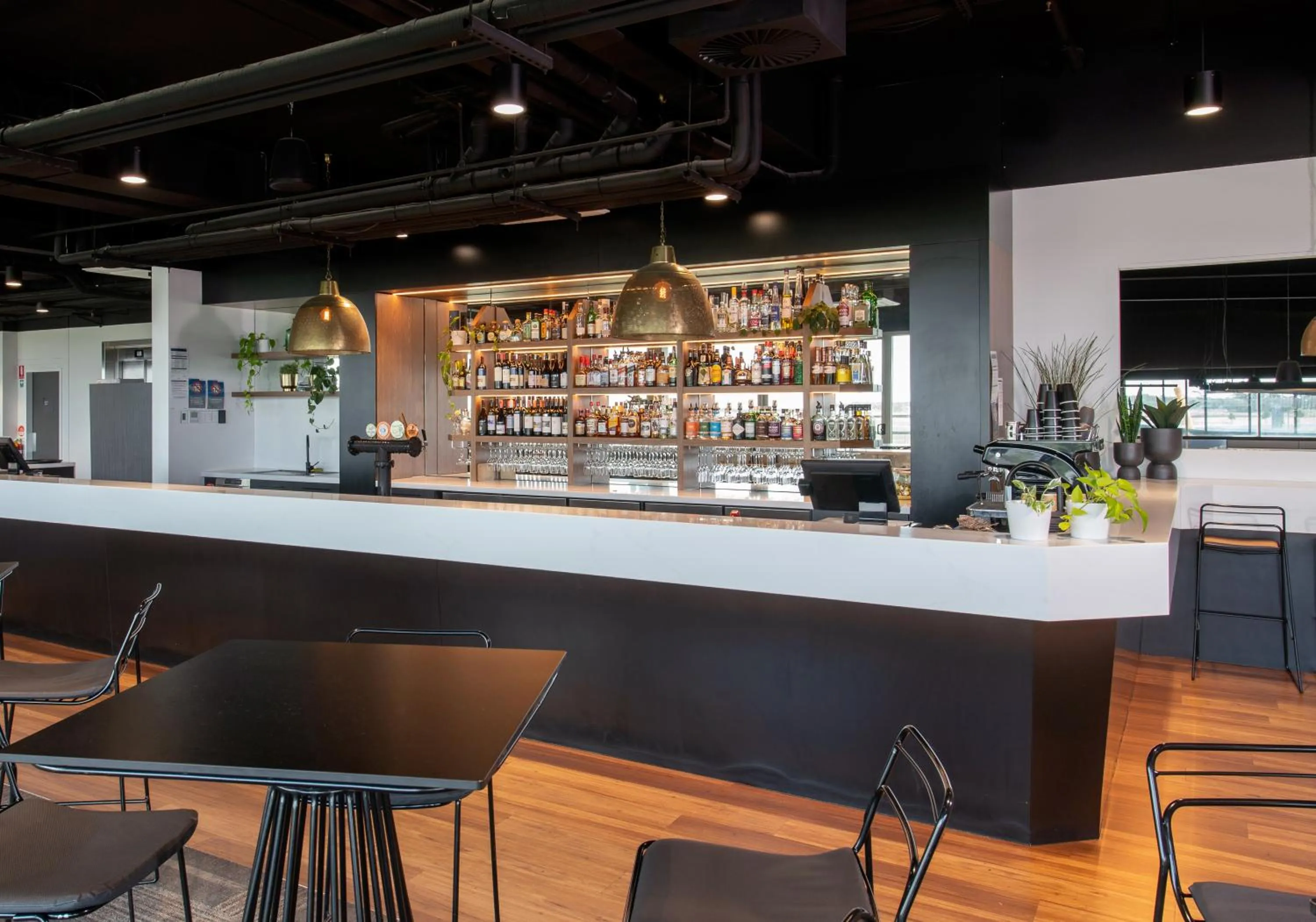 Lounge or bar in Rydges Pit Lane