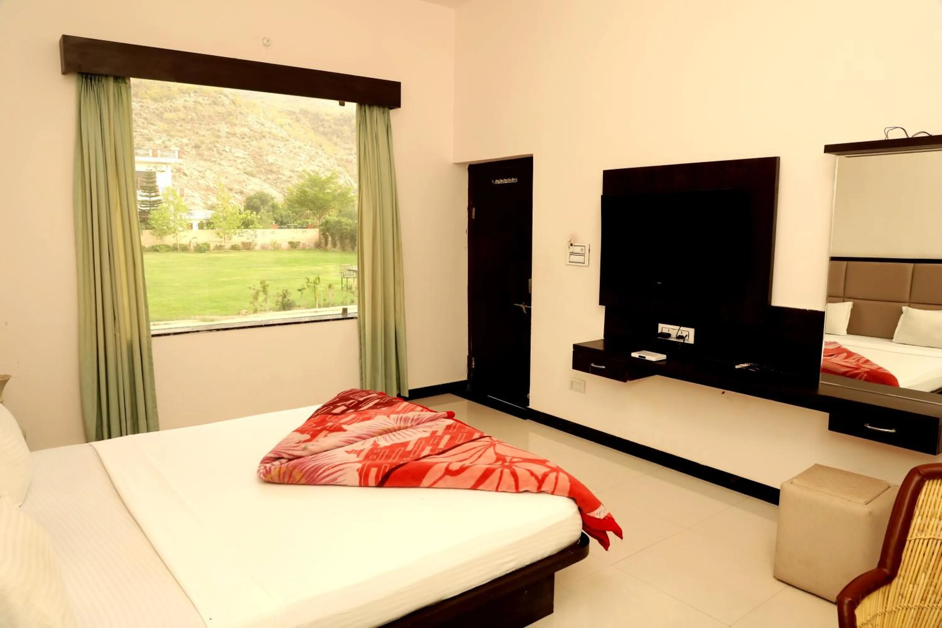 View (from property/room), Bed in Aravali Hills Resort