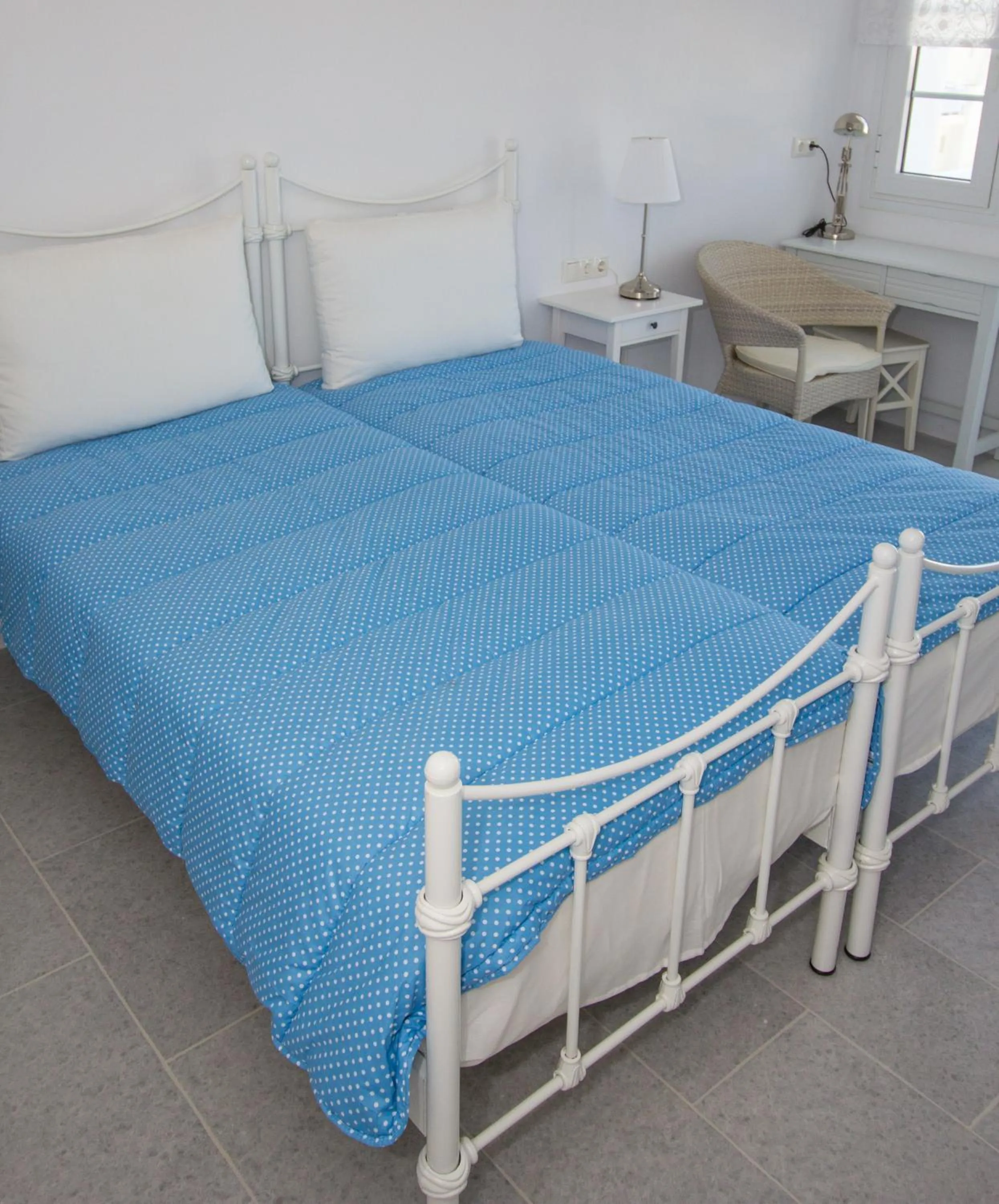Bed in Aspasia Luxury Apartments