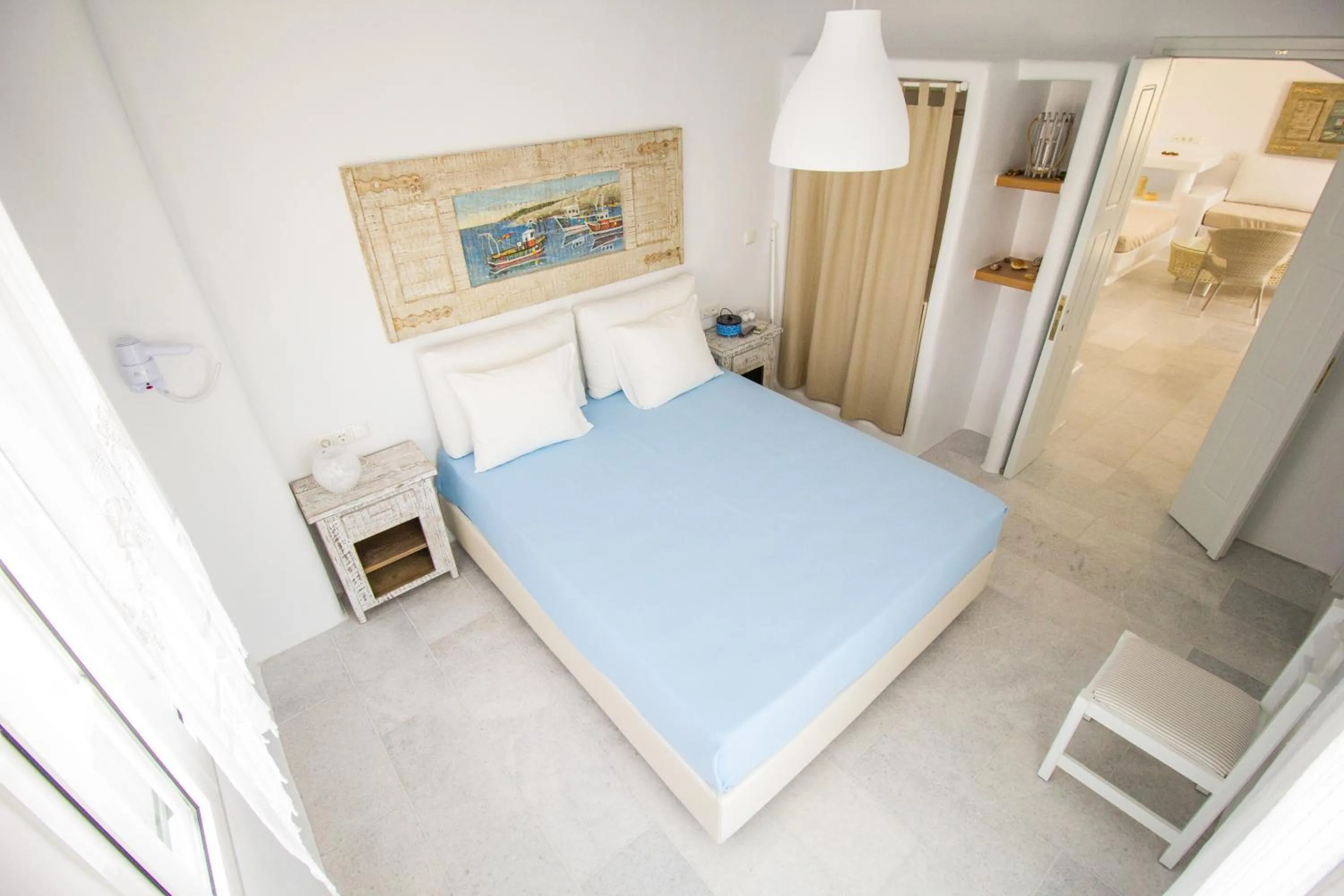 Bed in Aspasia Luxury Apartments