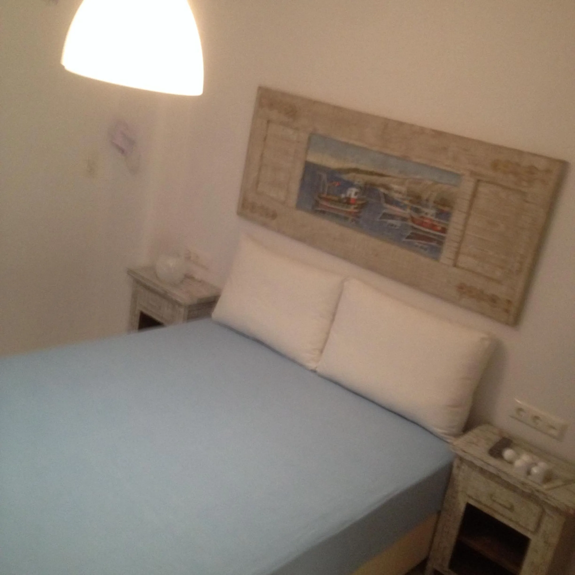 Bed in Aspasia Luxury Apartments