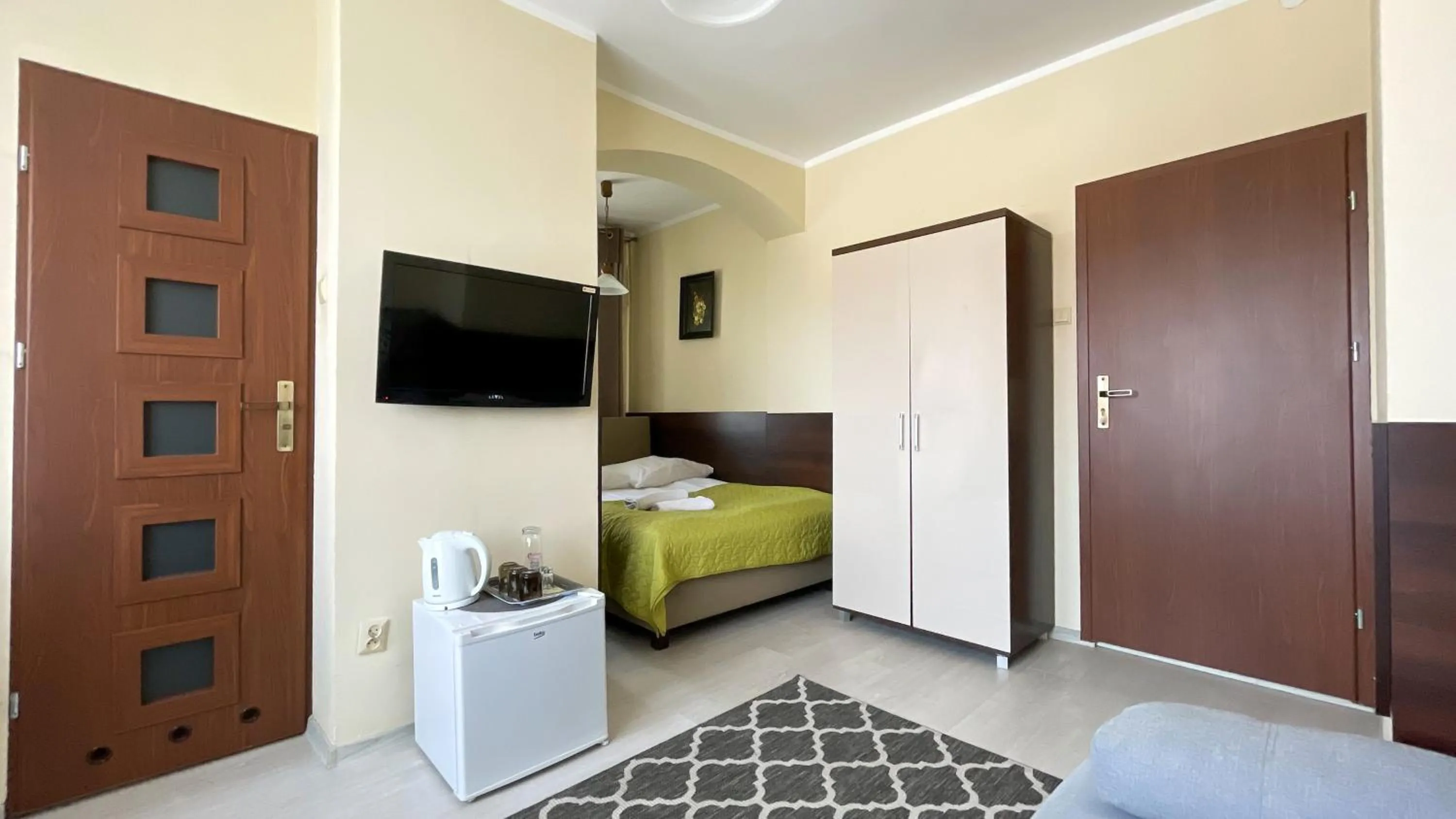 Communal lounge/ TV room, Bed in Mister