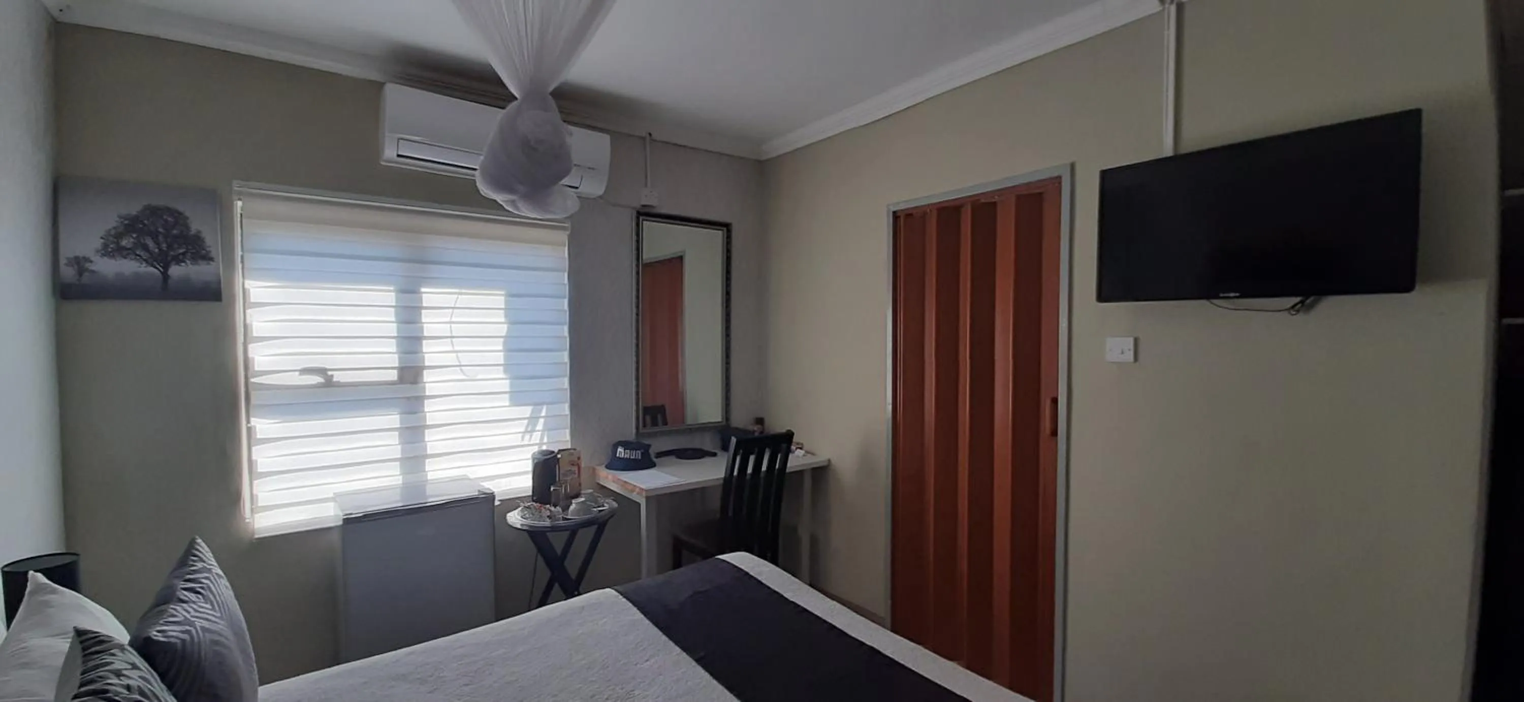 Photo of the whole room in The New Mall Guesthouse