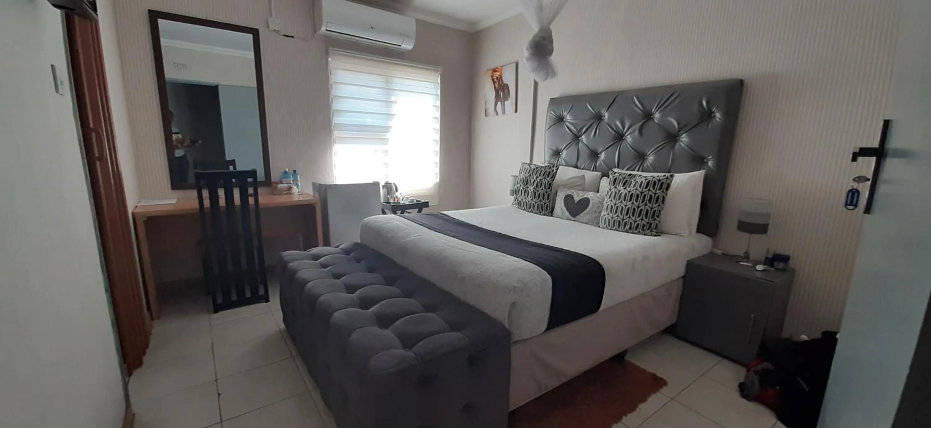 Photo of the whole room in The New Mall Guesthouse