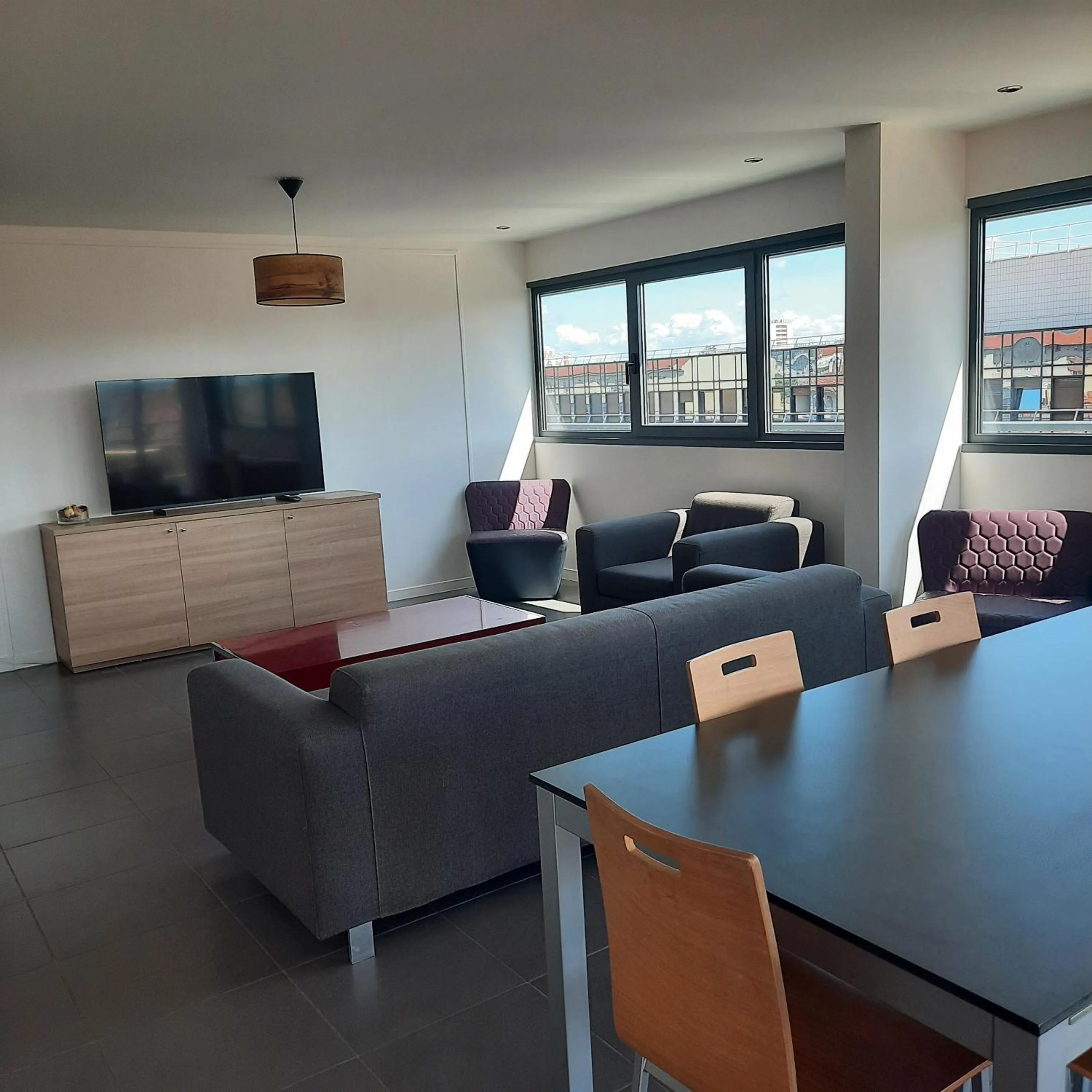 Living room in The Originals Residence Appart Hôtel Hévéa Valence
