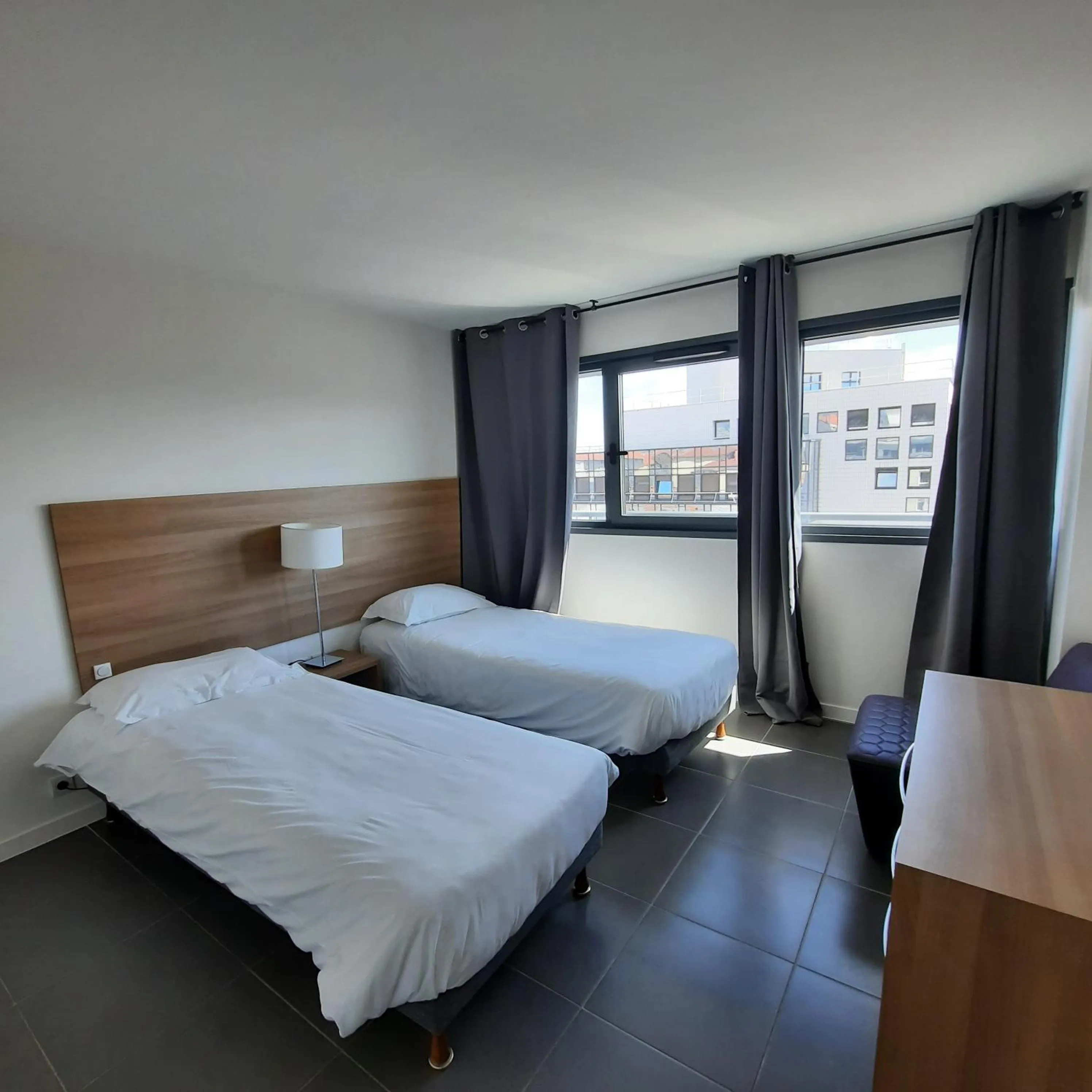 Bedroom, Bed in The Originals Residence Appart Hôtel Hévéa Valence