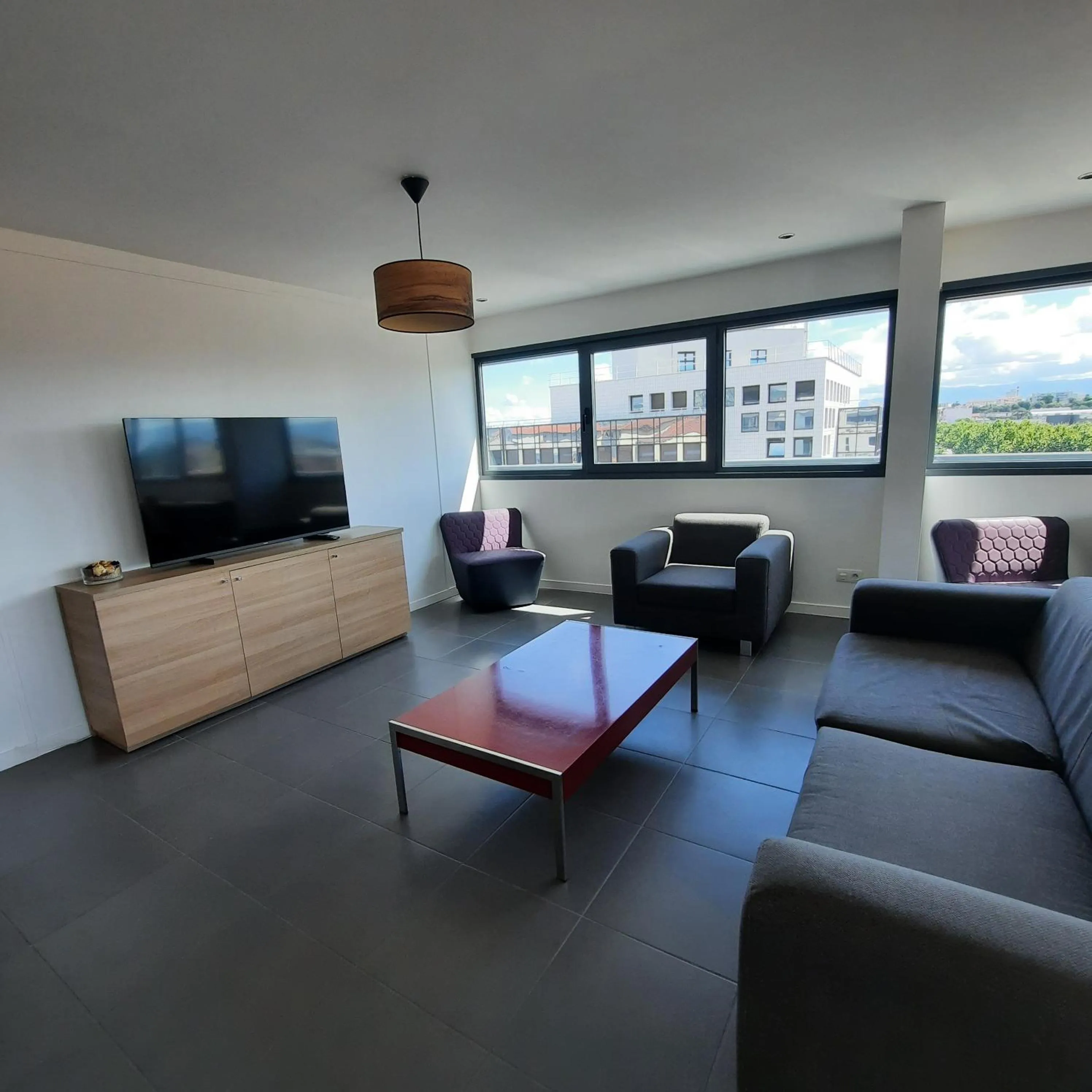 Living room in The Originals Residence Appart Hôtel Hévéa Valence