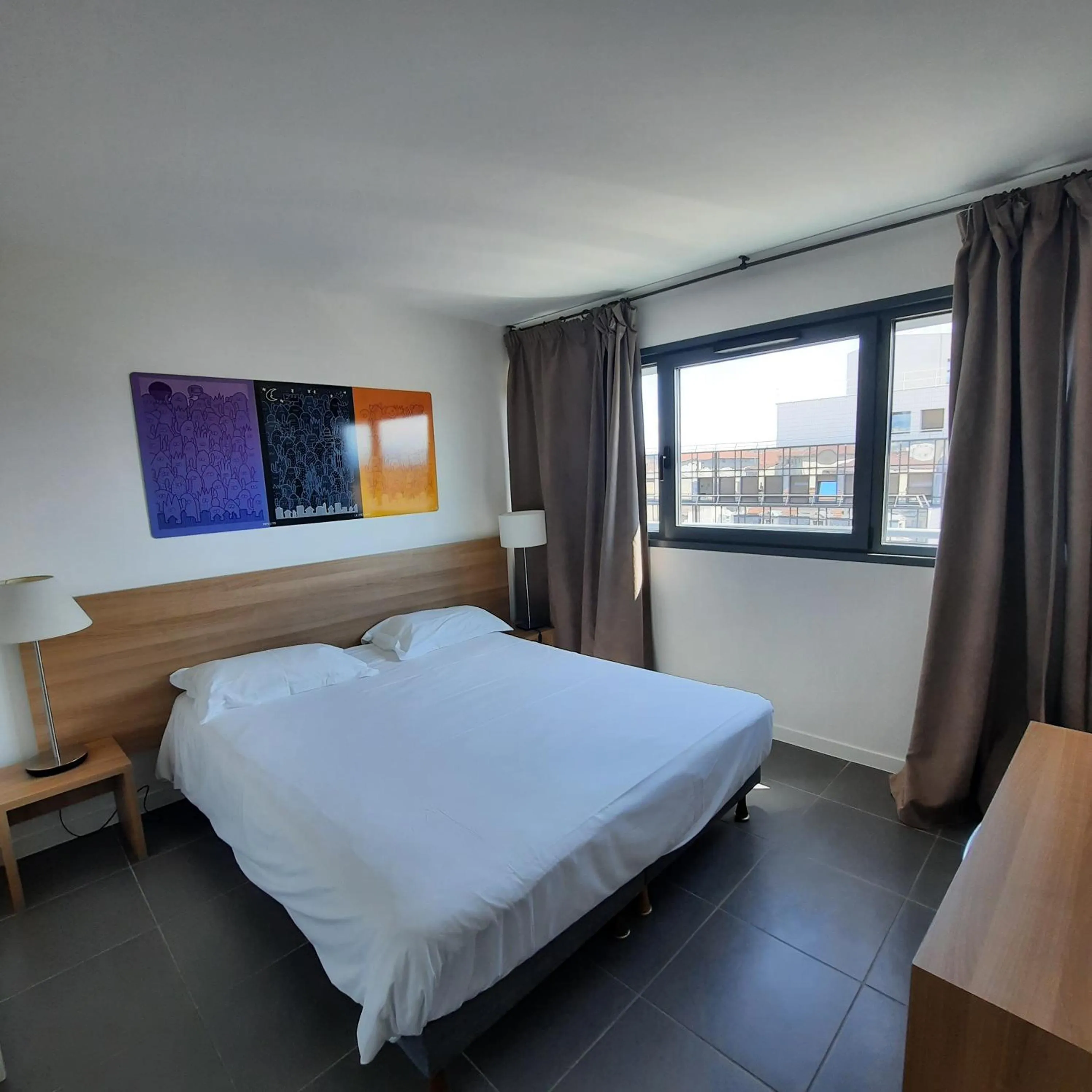 Bedroom, Bed in The Originals Residence Appart Hôtel Hévéa Valence