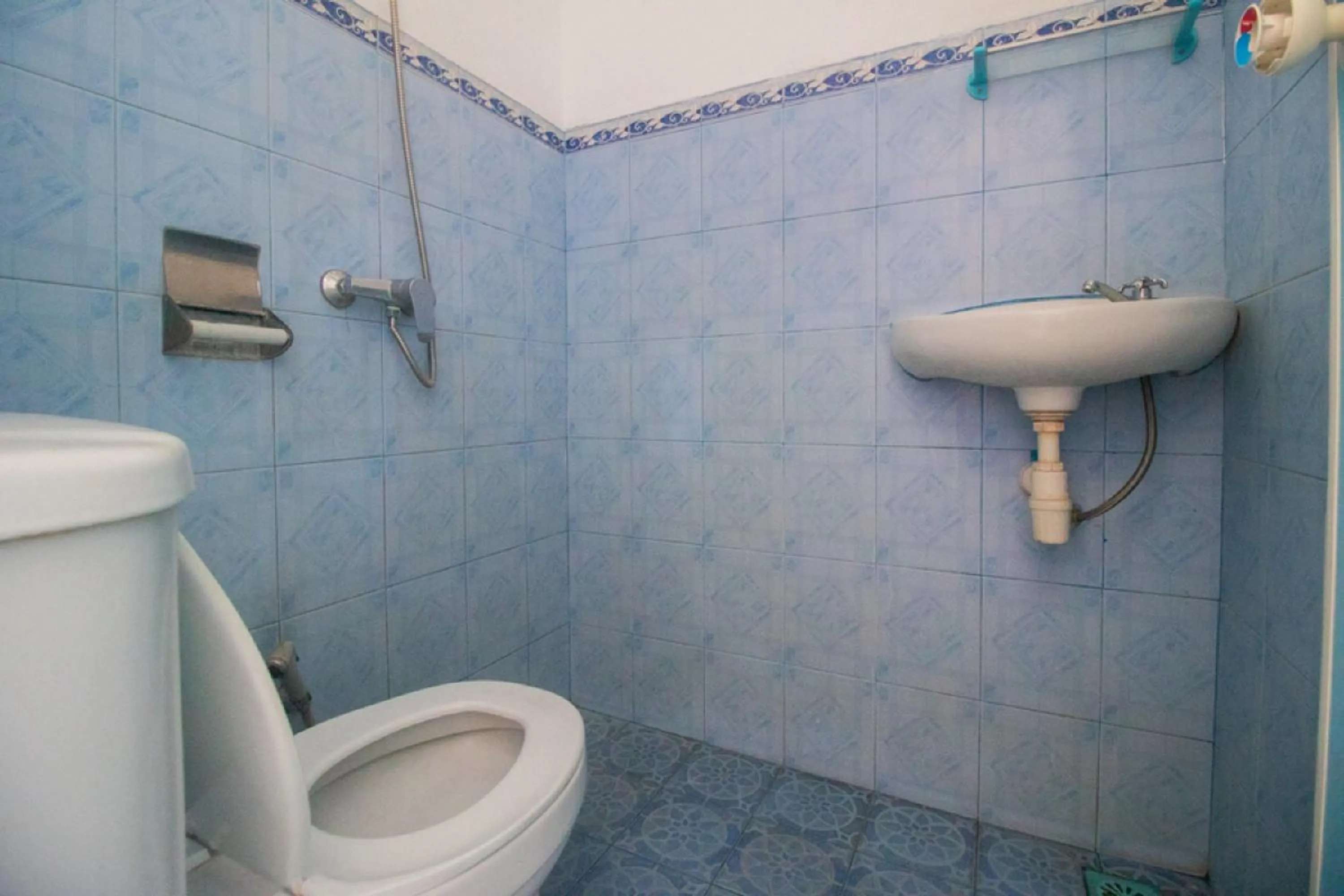 Bathroom in RedDoorz near Pantai Boom