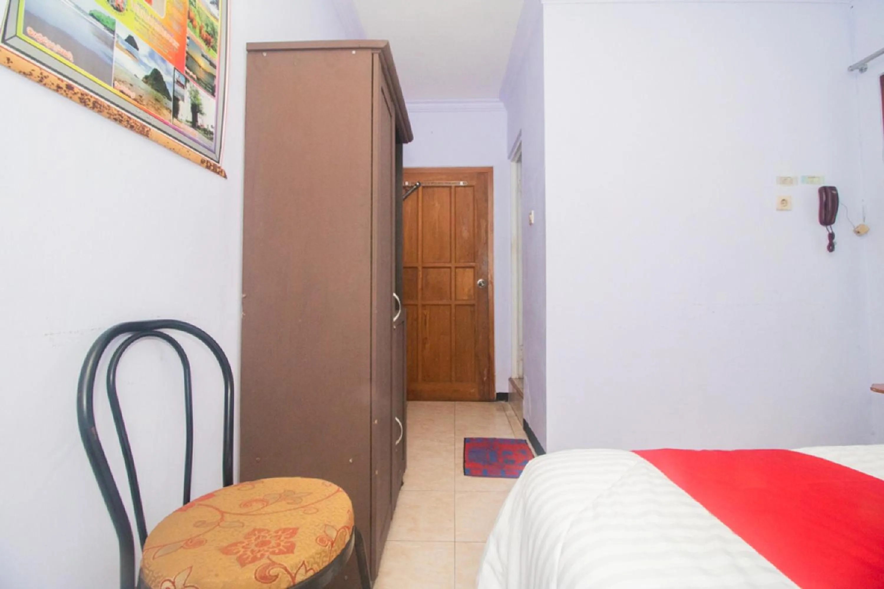 Bedroom, Bed in RedDoorz near Pantai Boom