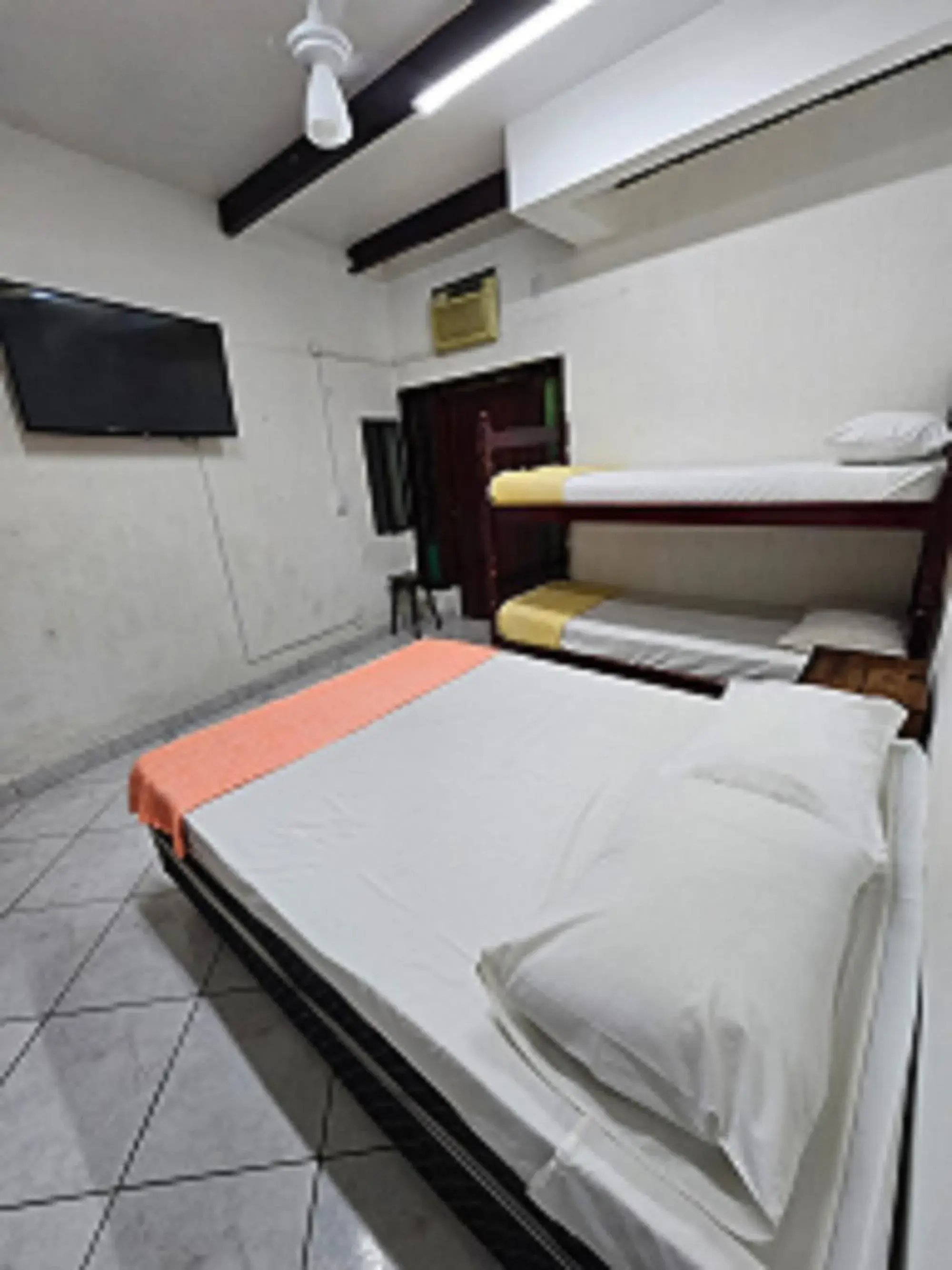 Economy Quadruple Room in Pousada Casa da Pedra Economy Quadruple Room in Pousada Casa da Pedra