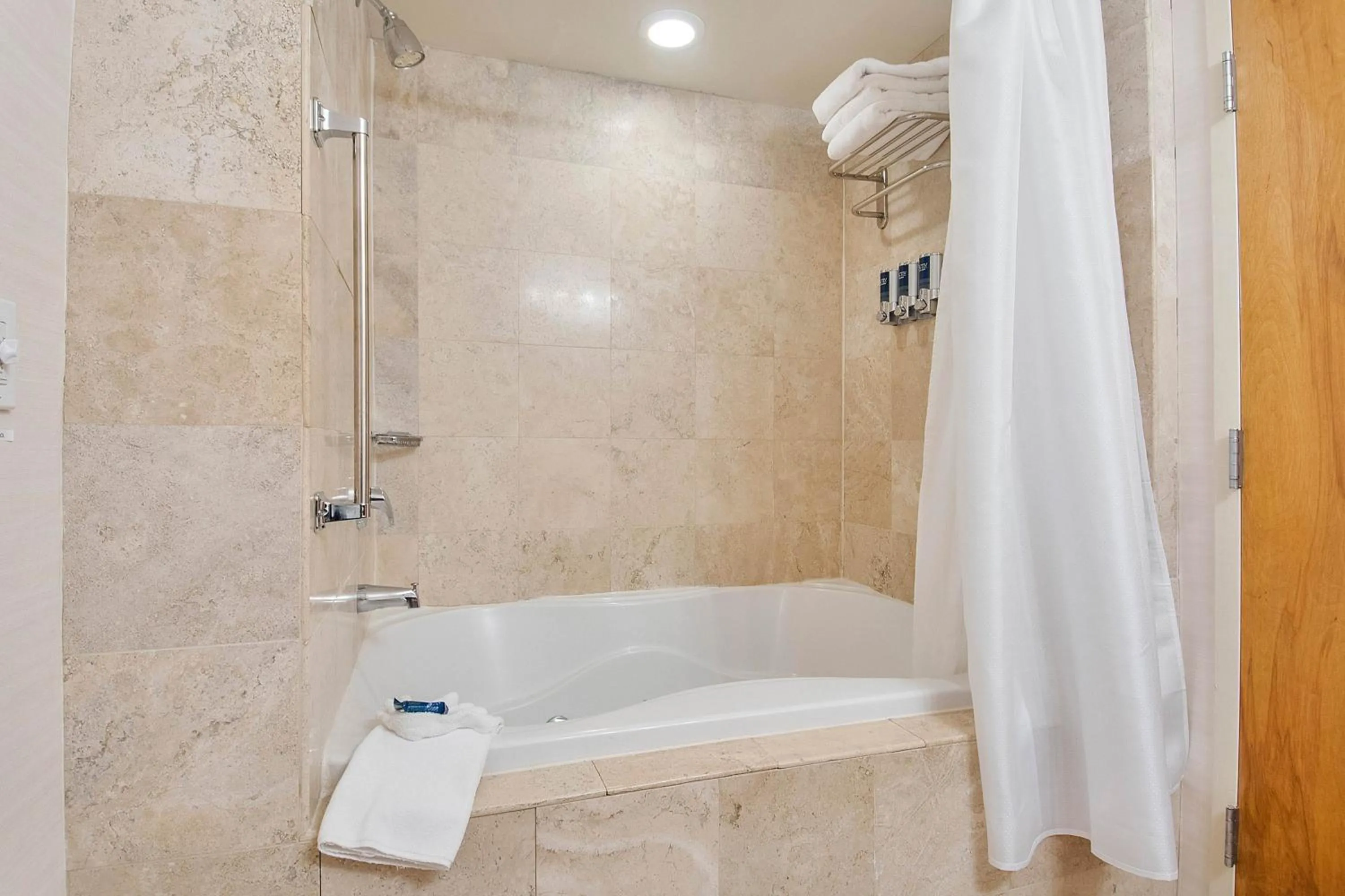 Bathroom in Four Points by Sheraton Melville Long Island