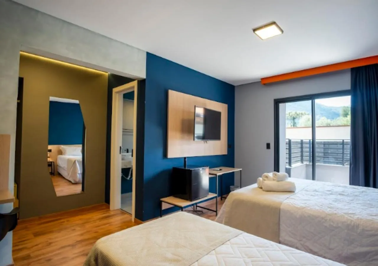 Bed in Minas Garden Hotel