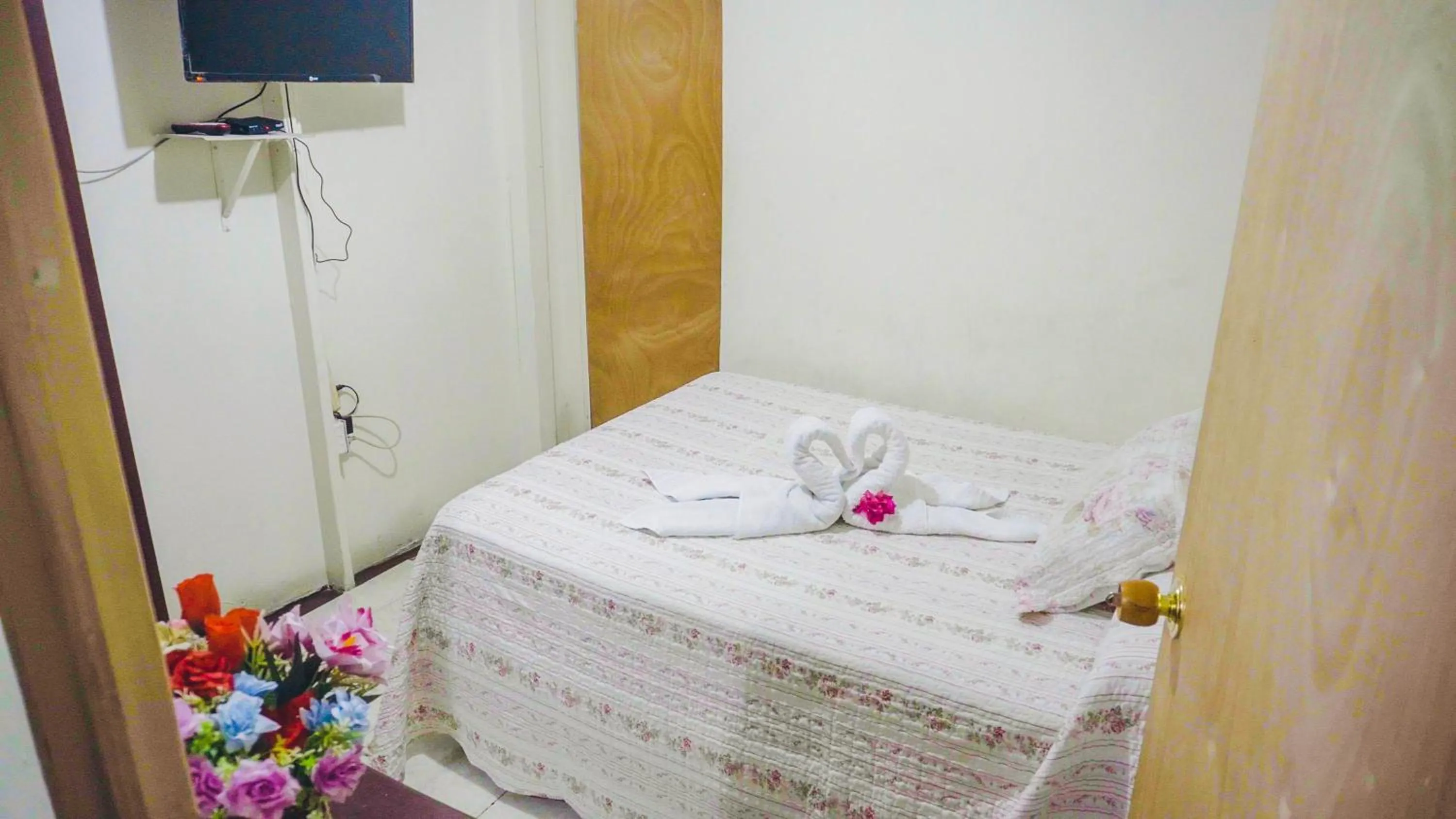 Bed in Posada Nativa Miss Trinie