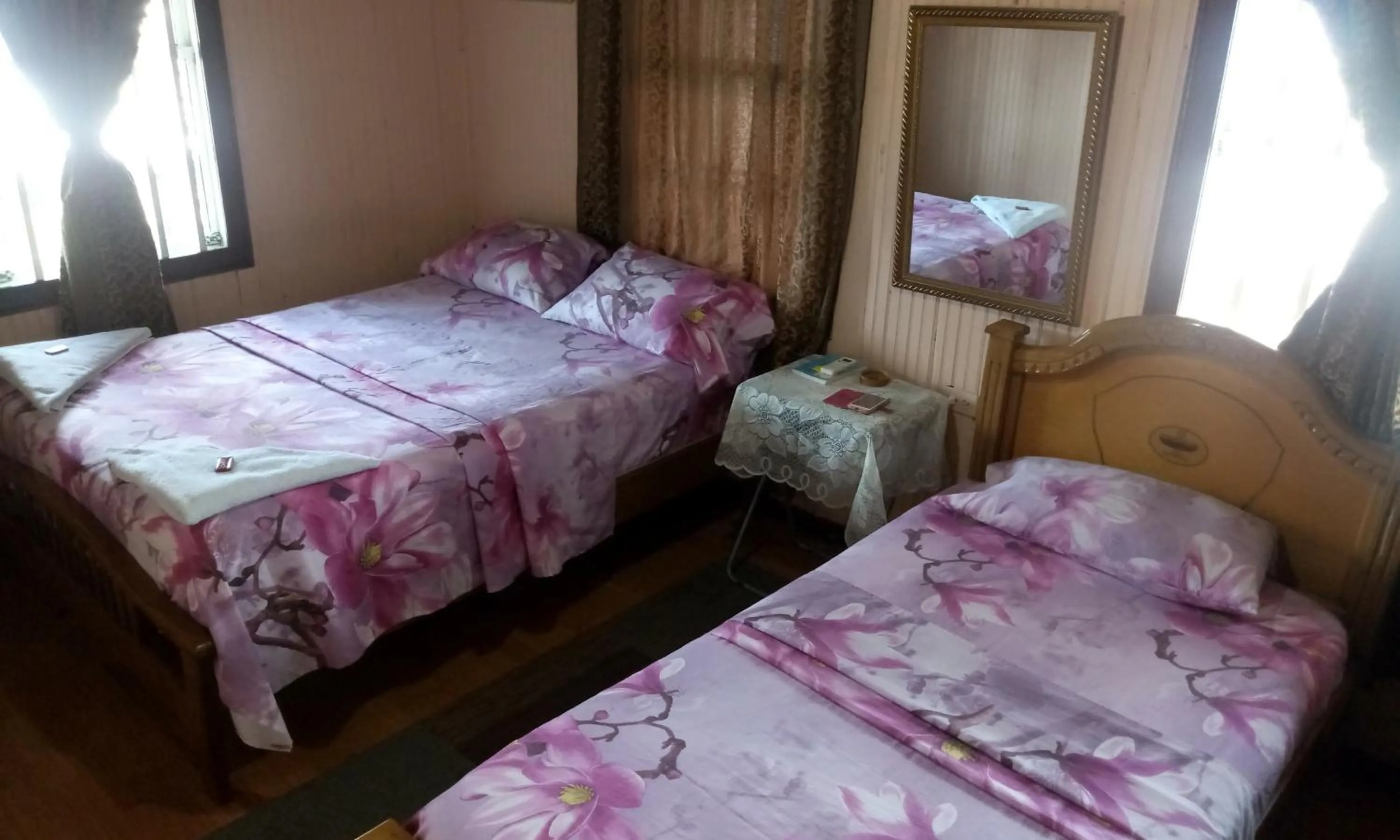 Bed in Posada Nativa Miss Trinie