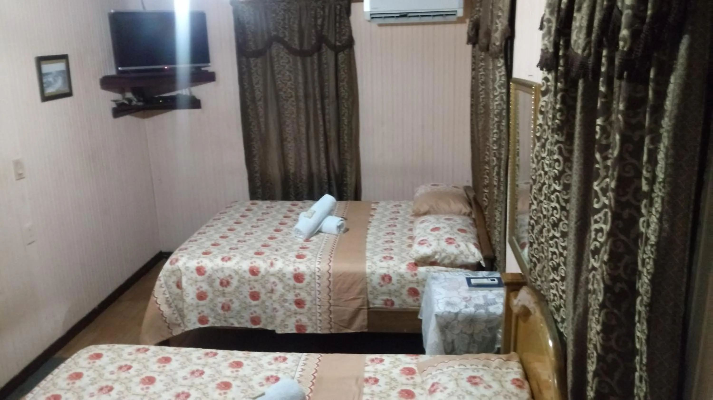 Bed in Posada Nativa Miss Trinie