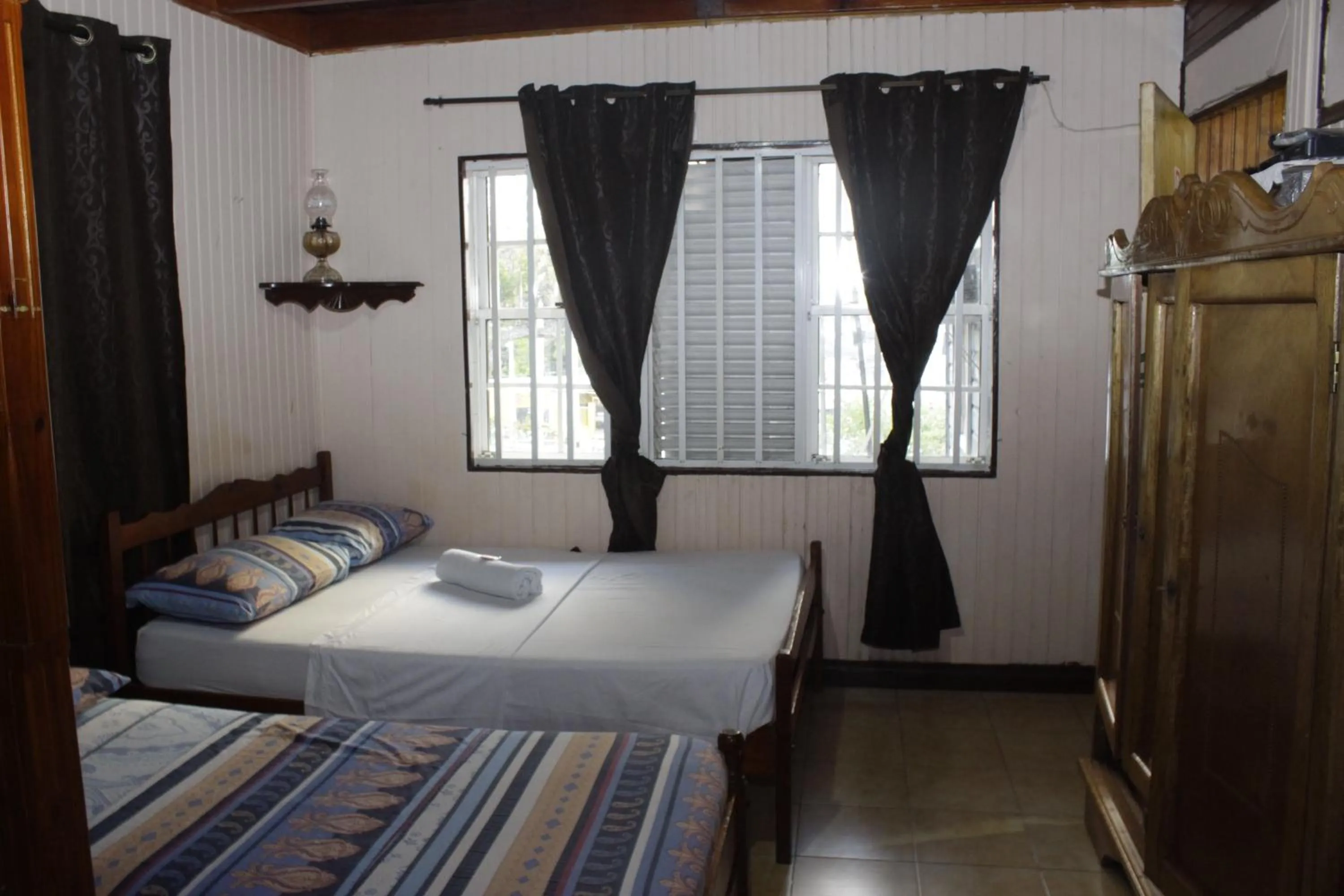 Bed in Posada Nativa Miss Trinie