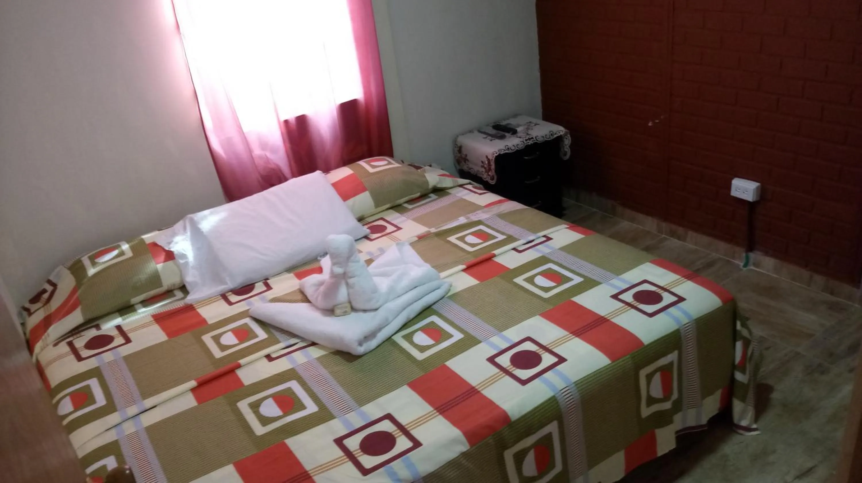 Bed in Posada Nativa Miss Trinie