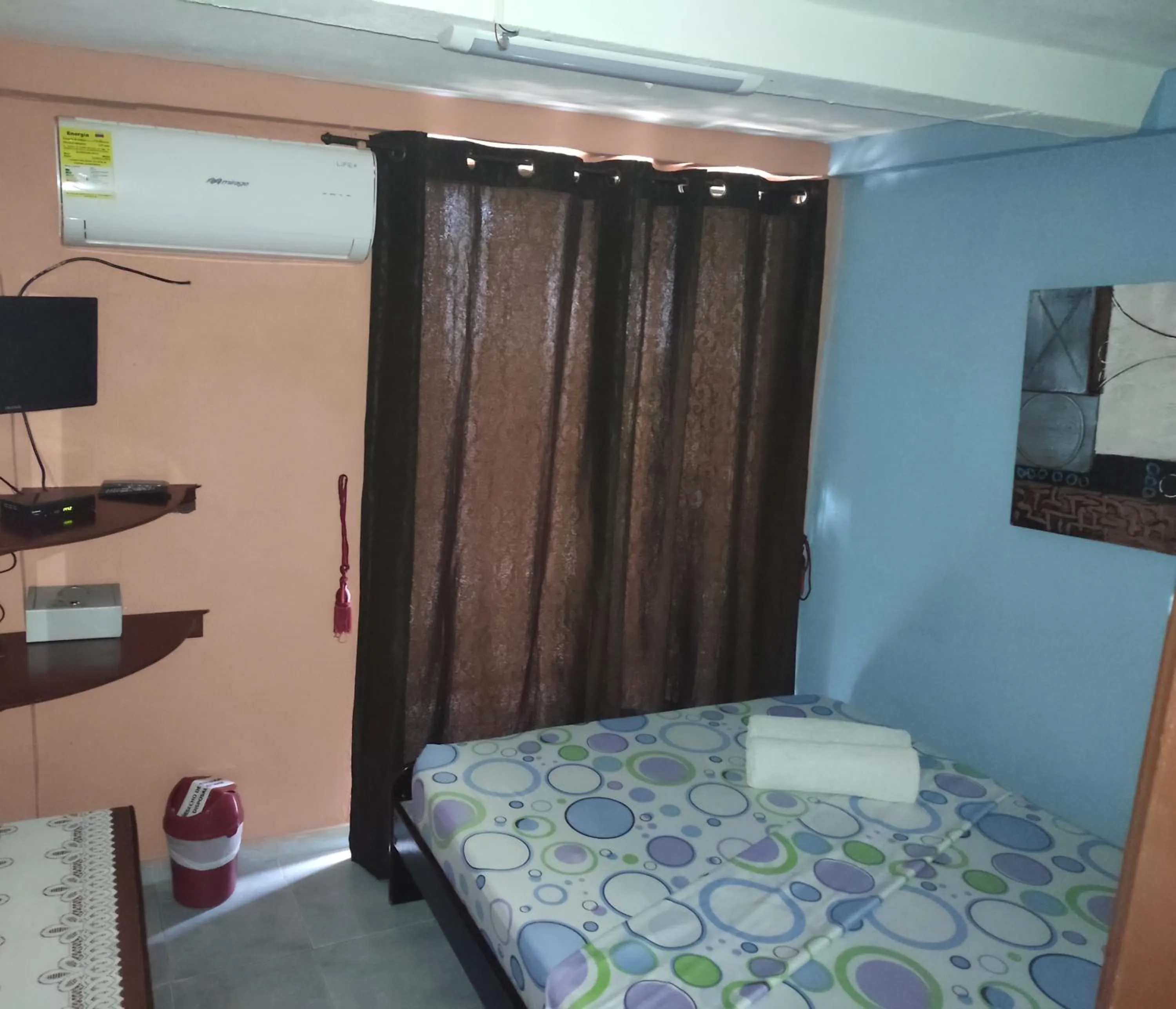 Bed in Posada Nativa Miss Trinie