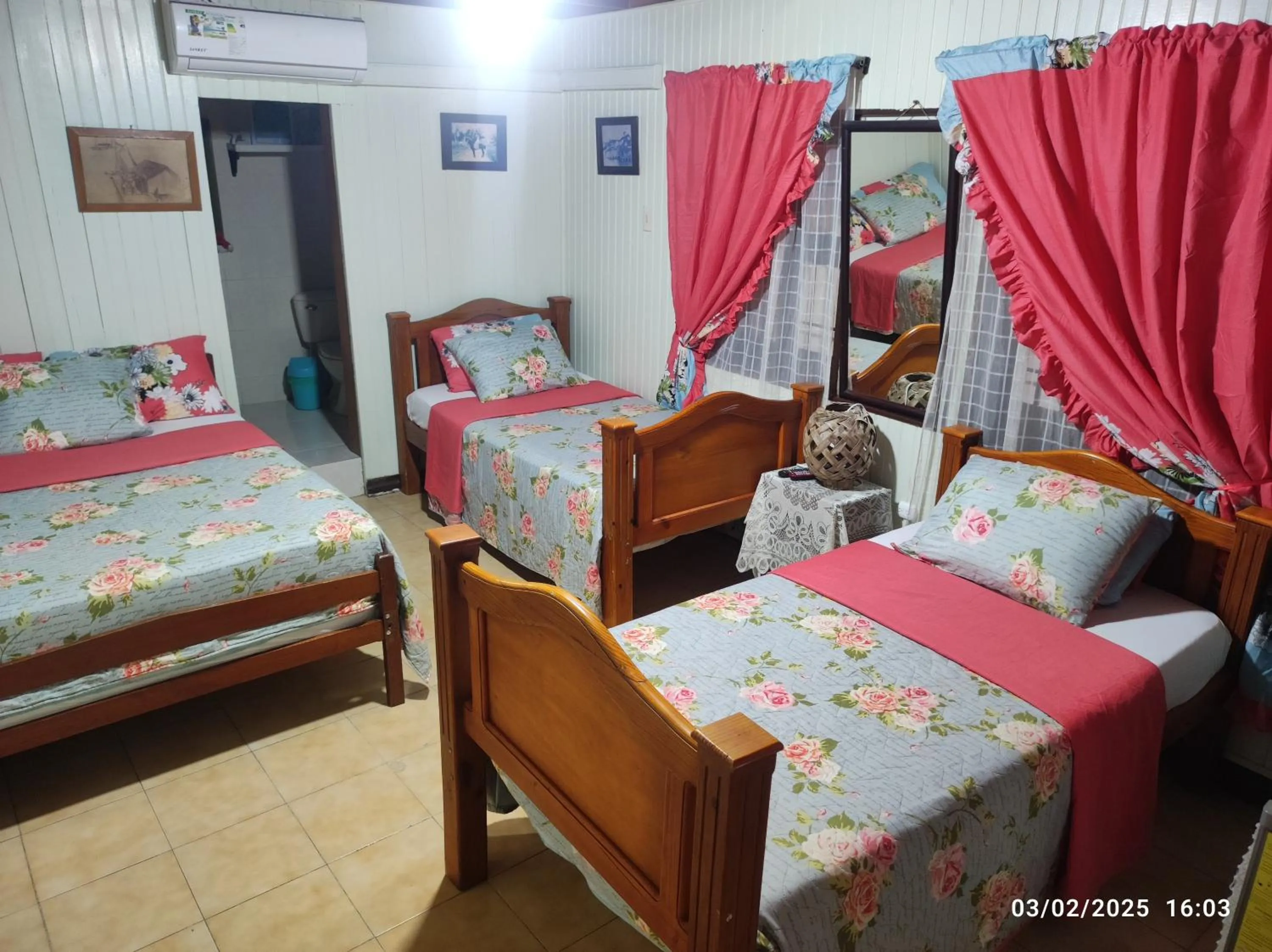 Bed in Posada Nativa Miss Trinie