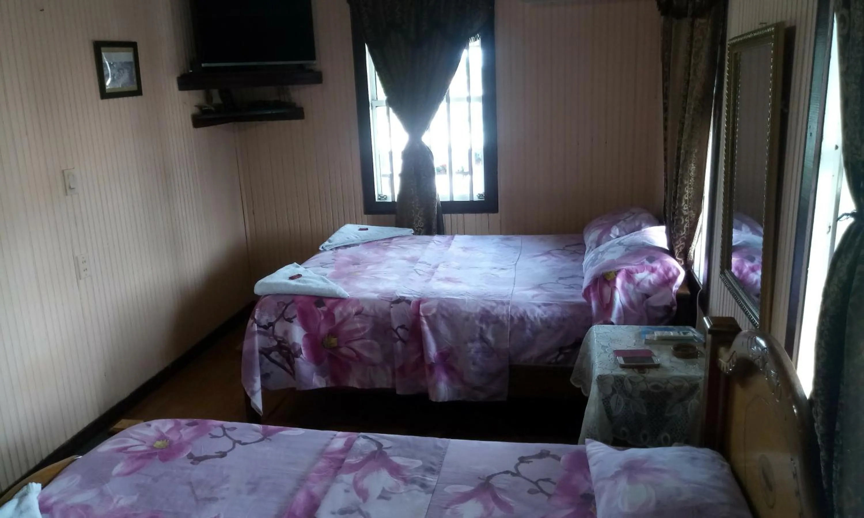 Bed in Posada Nativa Miss Trinie