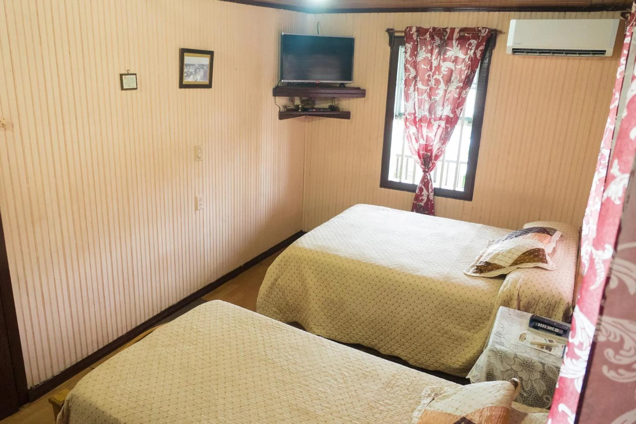 Bed in Posada Nativa Miss Trinie