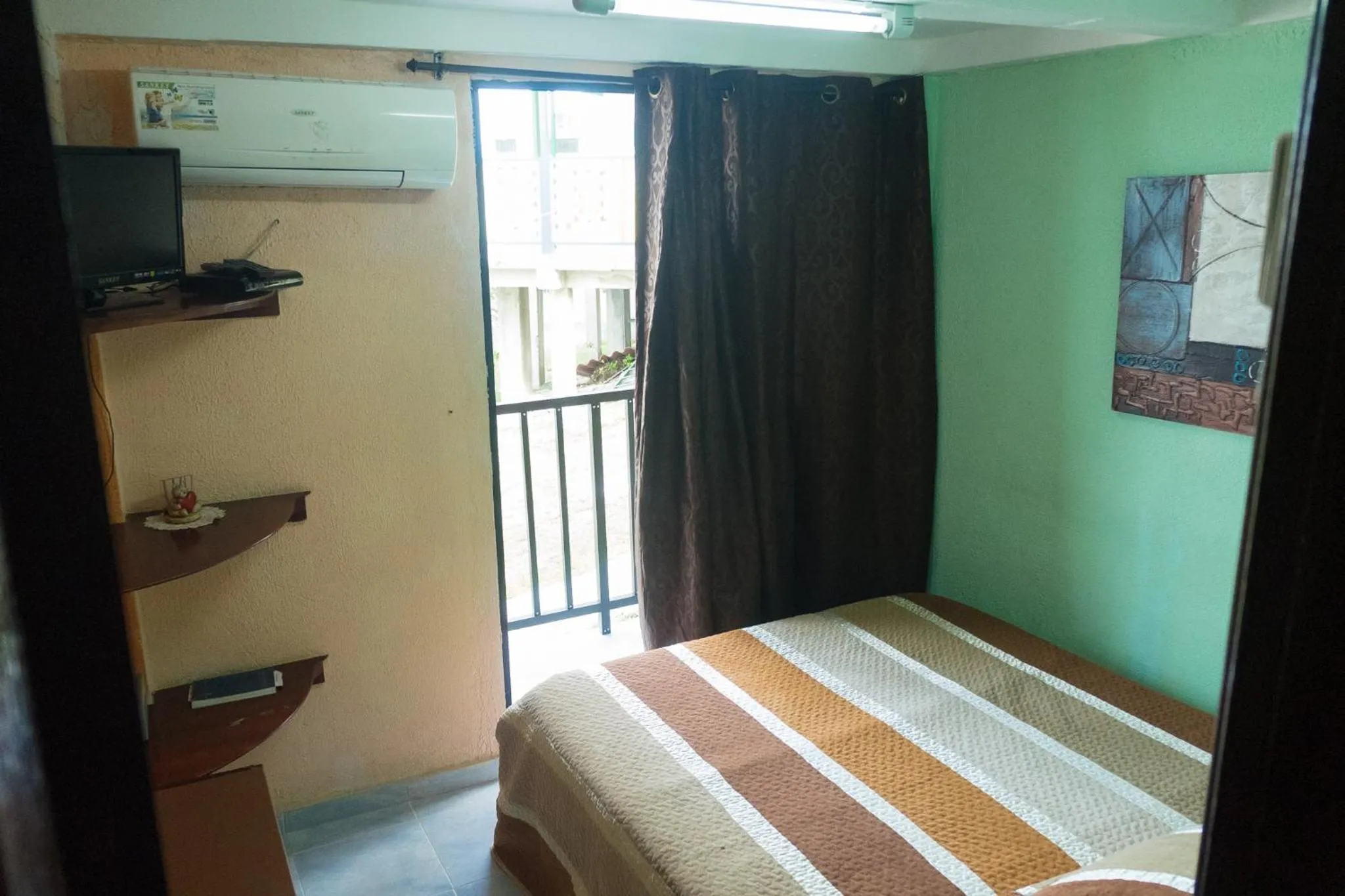 Bed in Posada Nativa Miss Trinie