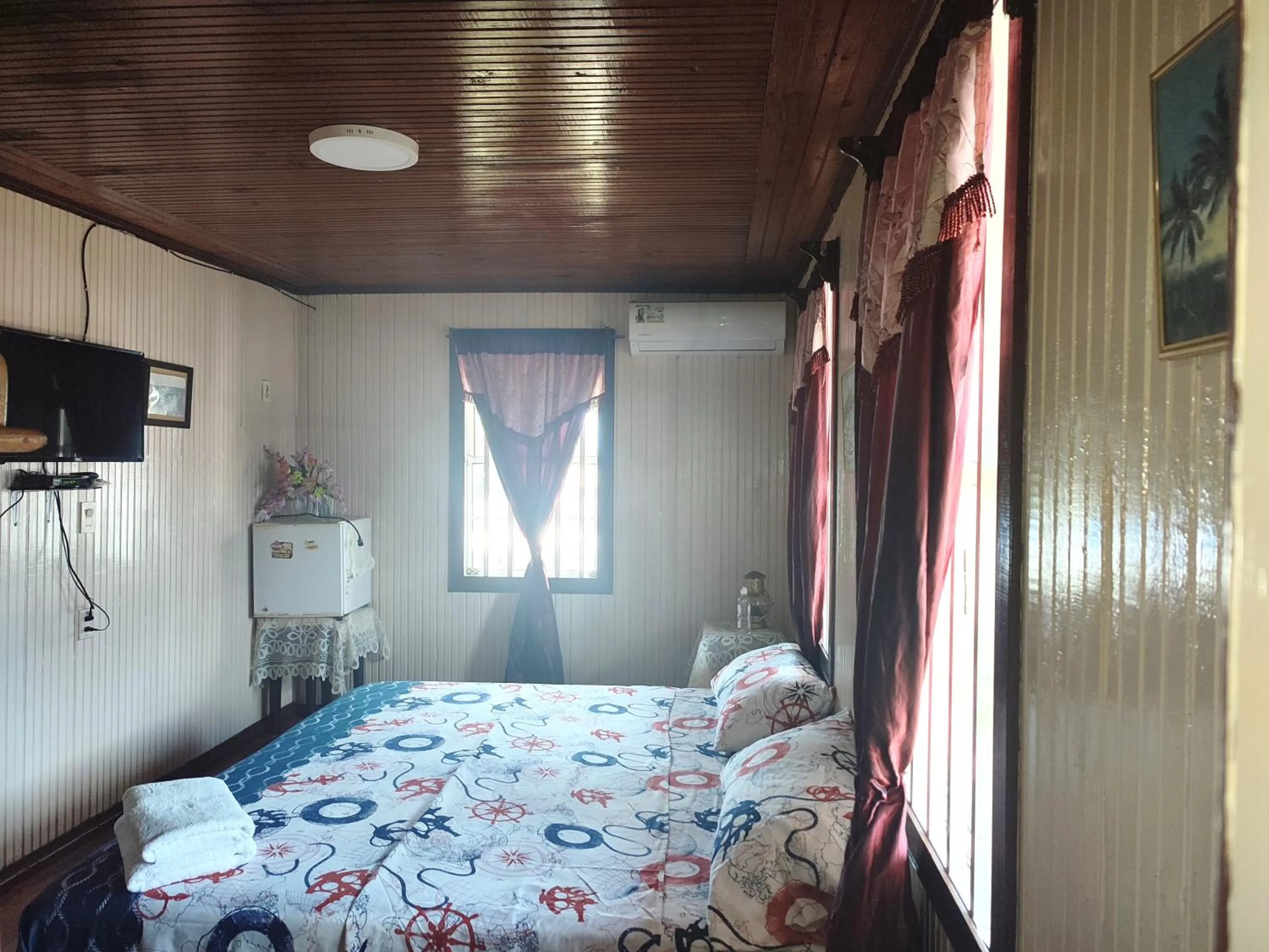 Bed in Posada Nativa Miss Trinie