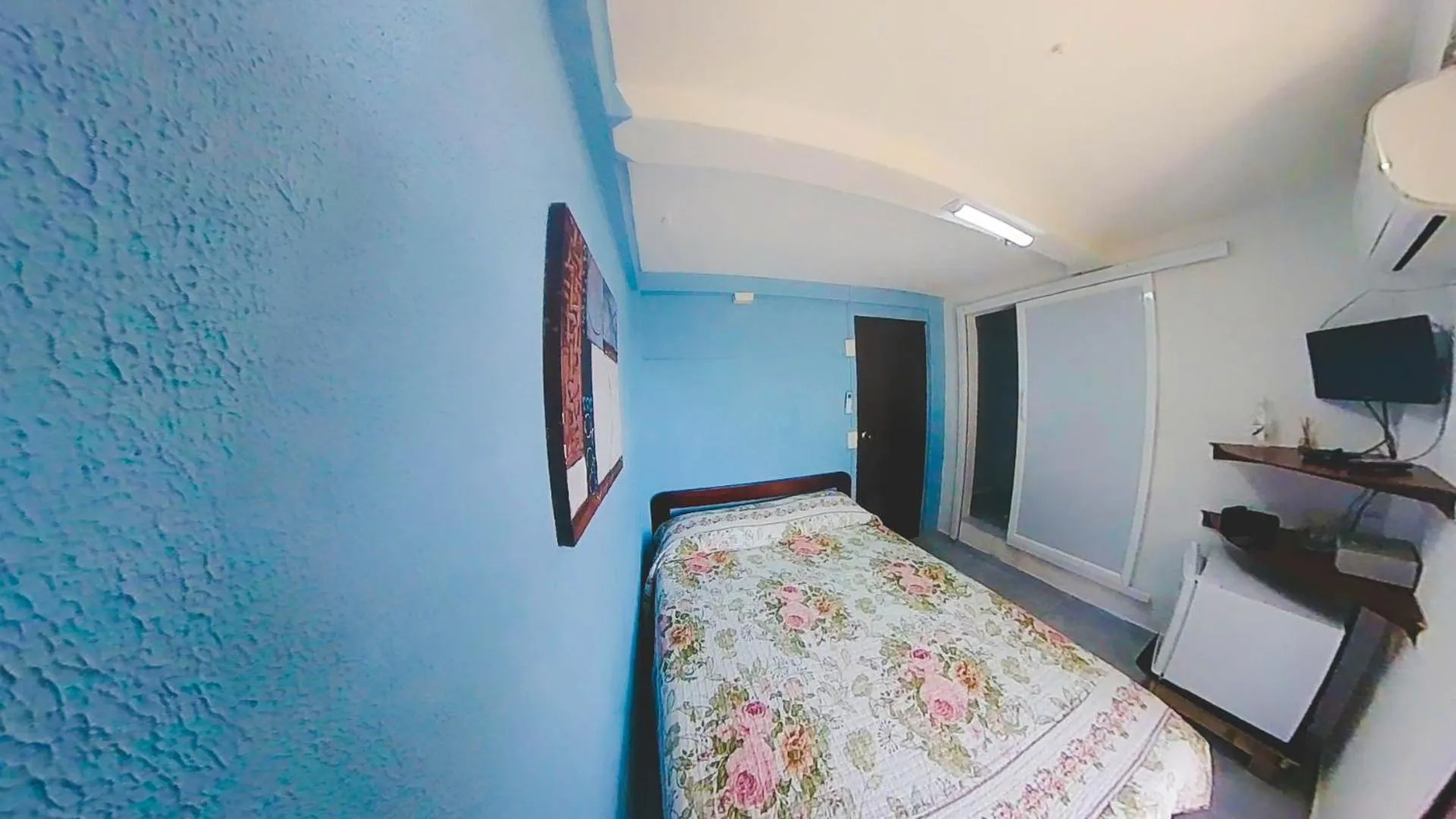 Bed in Posada Nativa Miss Trinie