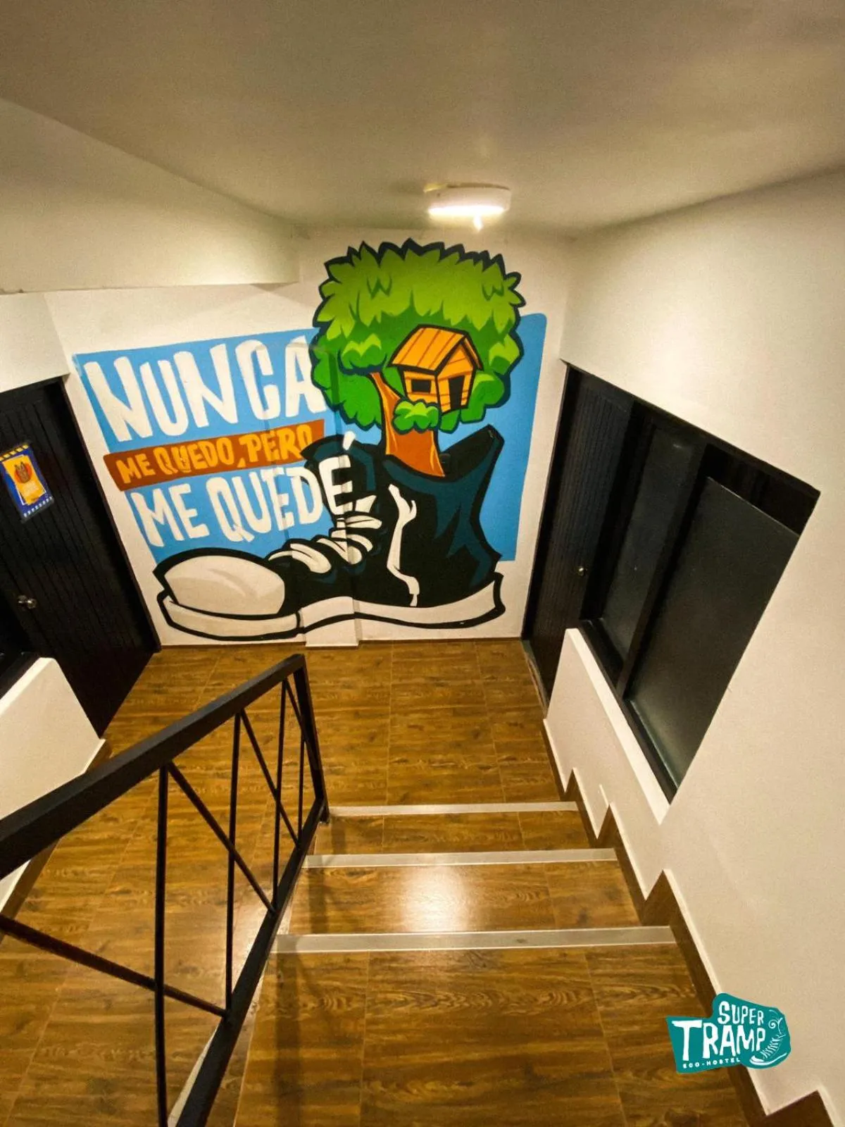 Text overlay in Supertramp Hostel Machupicchu