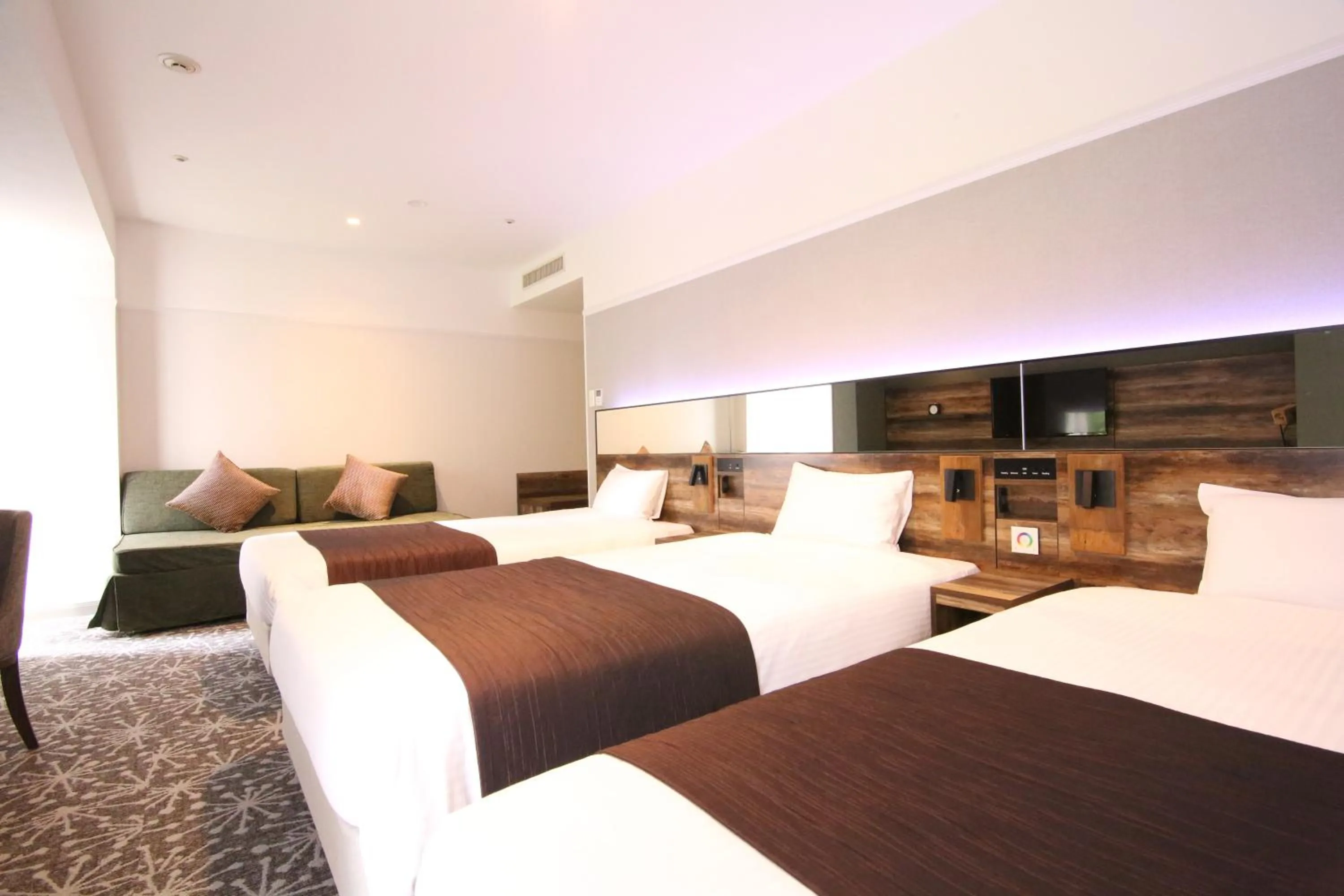 Photo of the whole room, Bed in Quintessa Hotel Sapporo