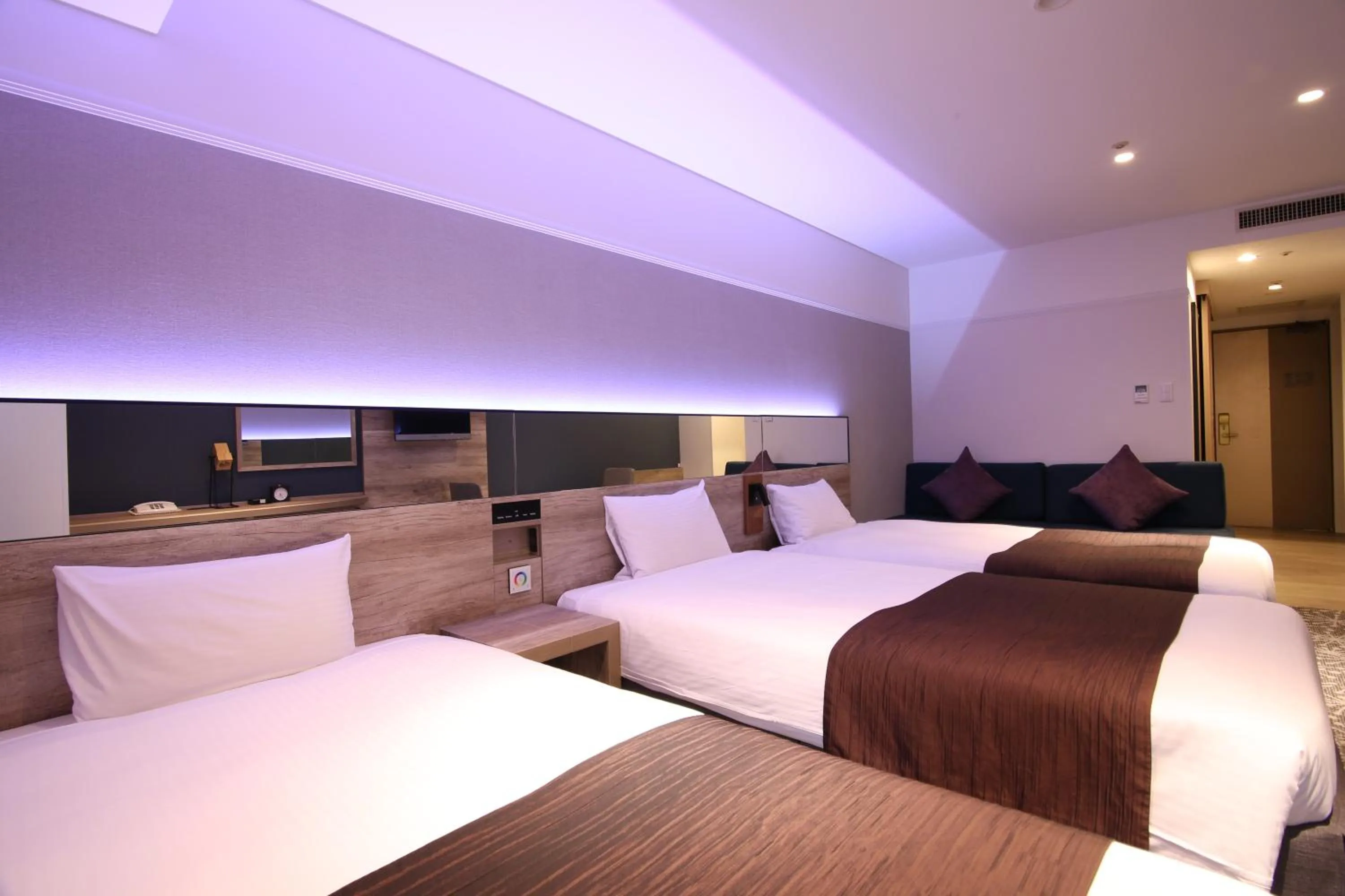 Photo of the whole room, Bed in Quintessa Hotel Sapporo