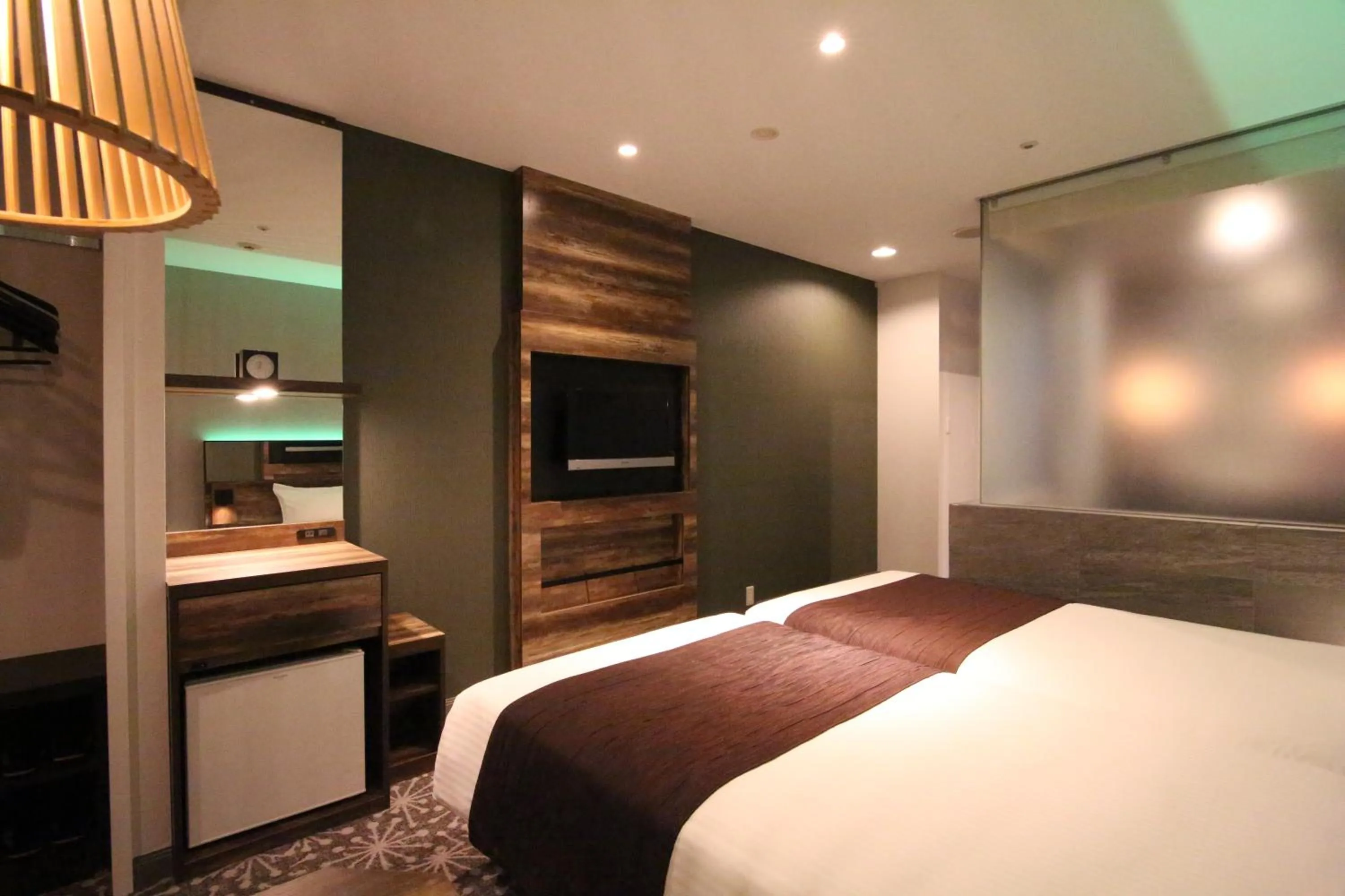 Photo of the whole room, Bed in Quintessa Hotel Sapporo