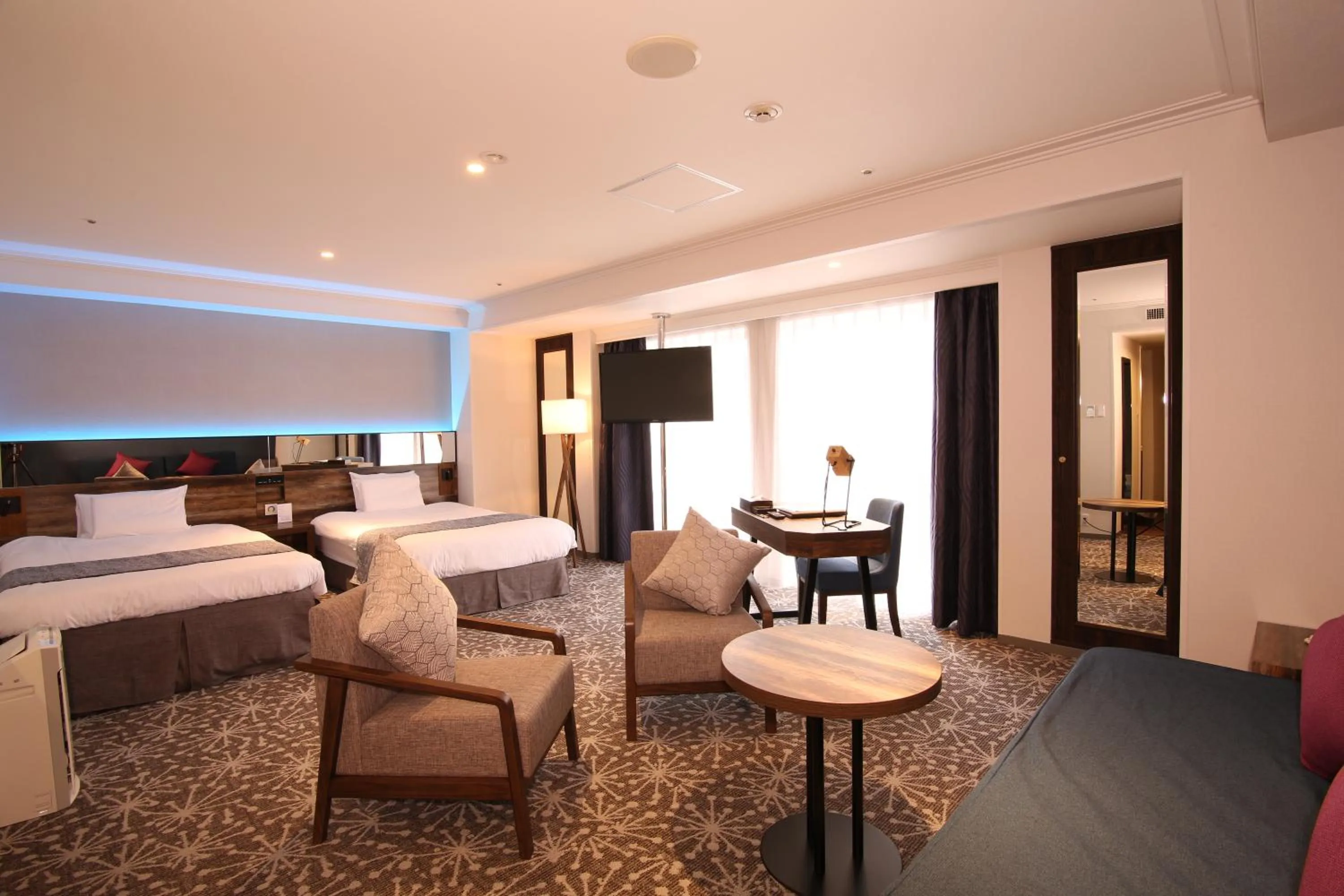 Photo of the whole room, Bed in Quintessa Hotel Sapporo