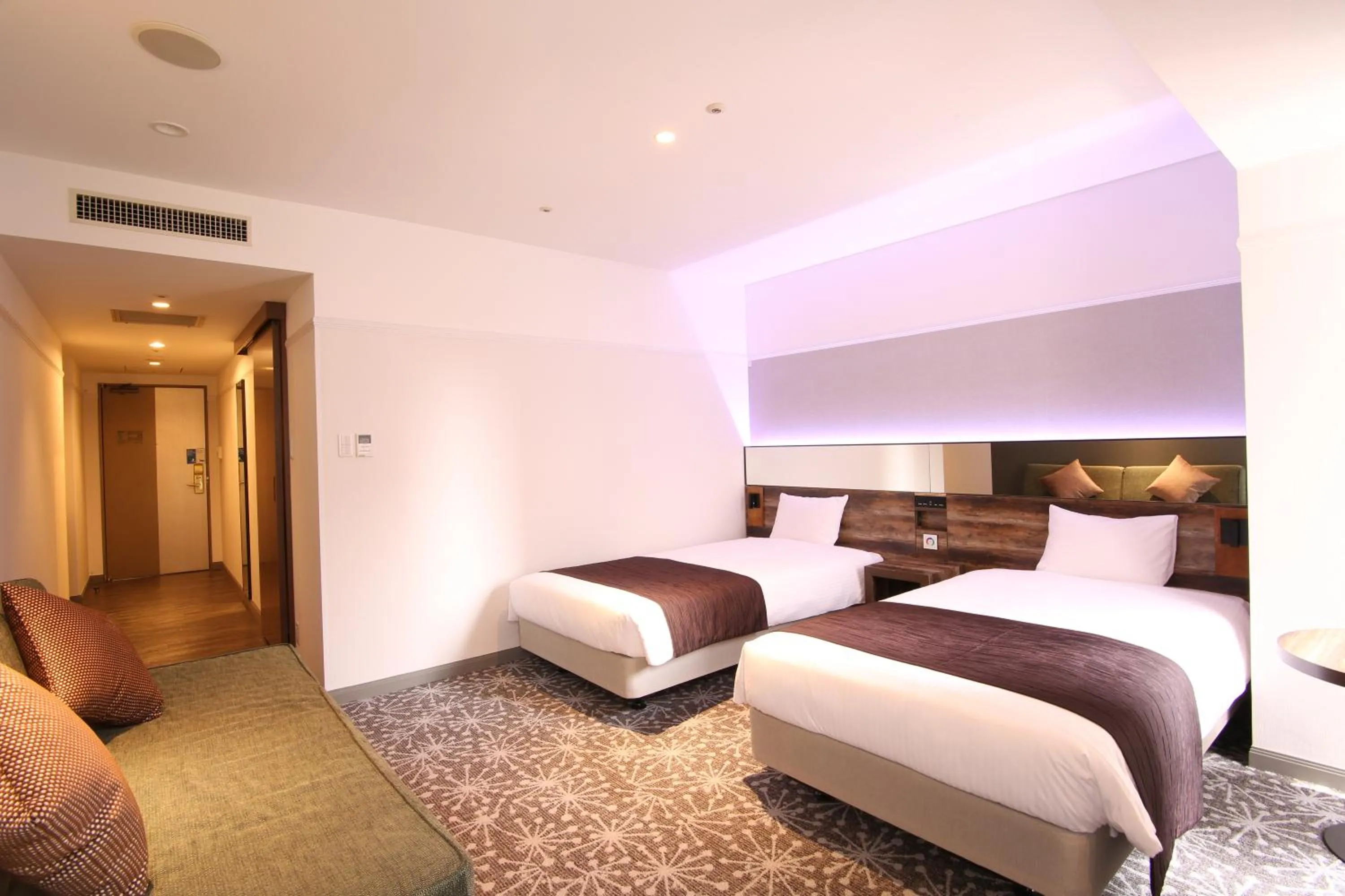 Photo of the whole room, Bed in Quintessa Hotel Sapporo