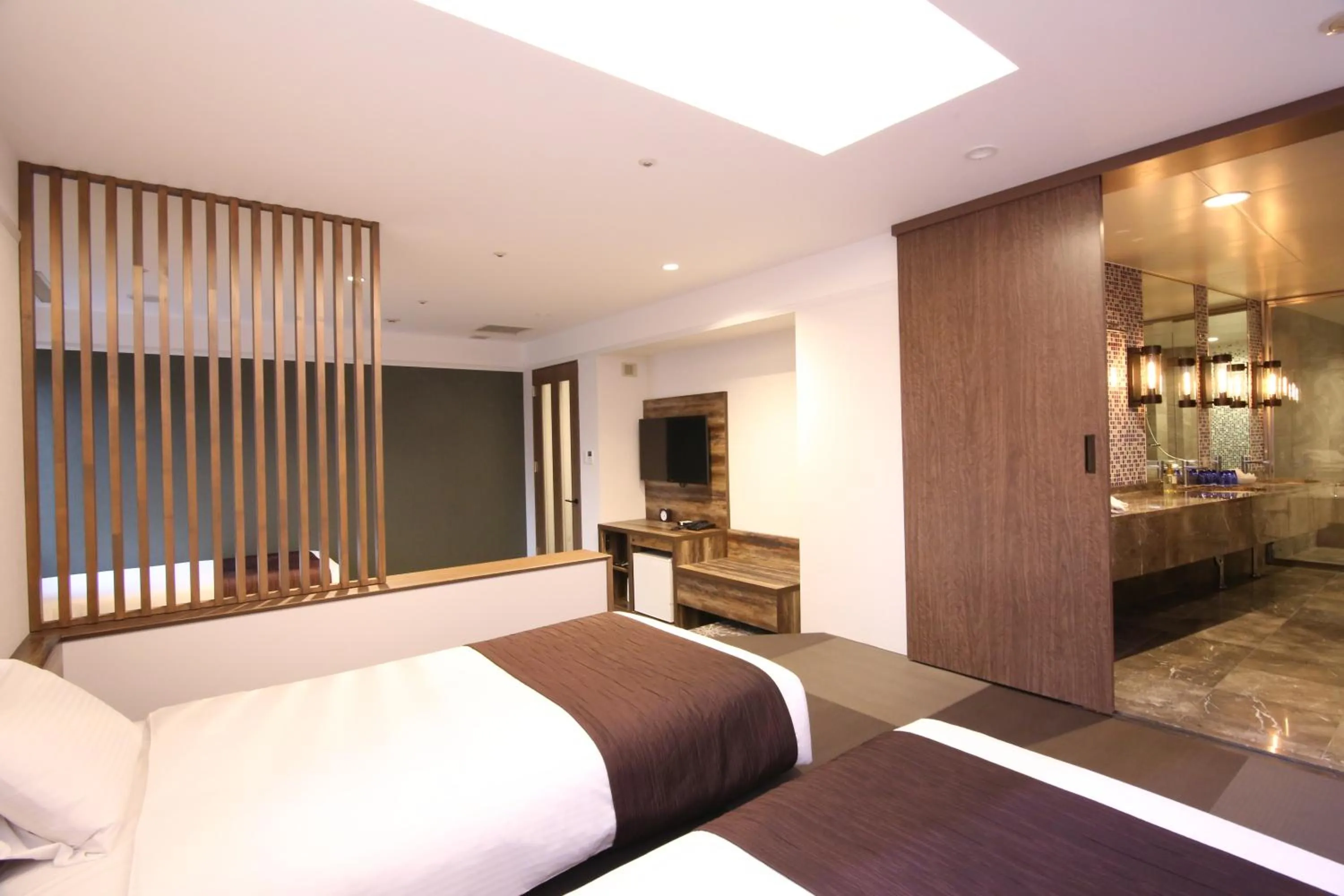 Photo of the whole room, Bed in Quintessa Hotel Sapporo