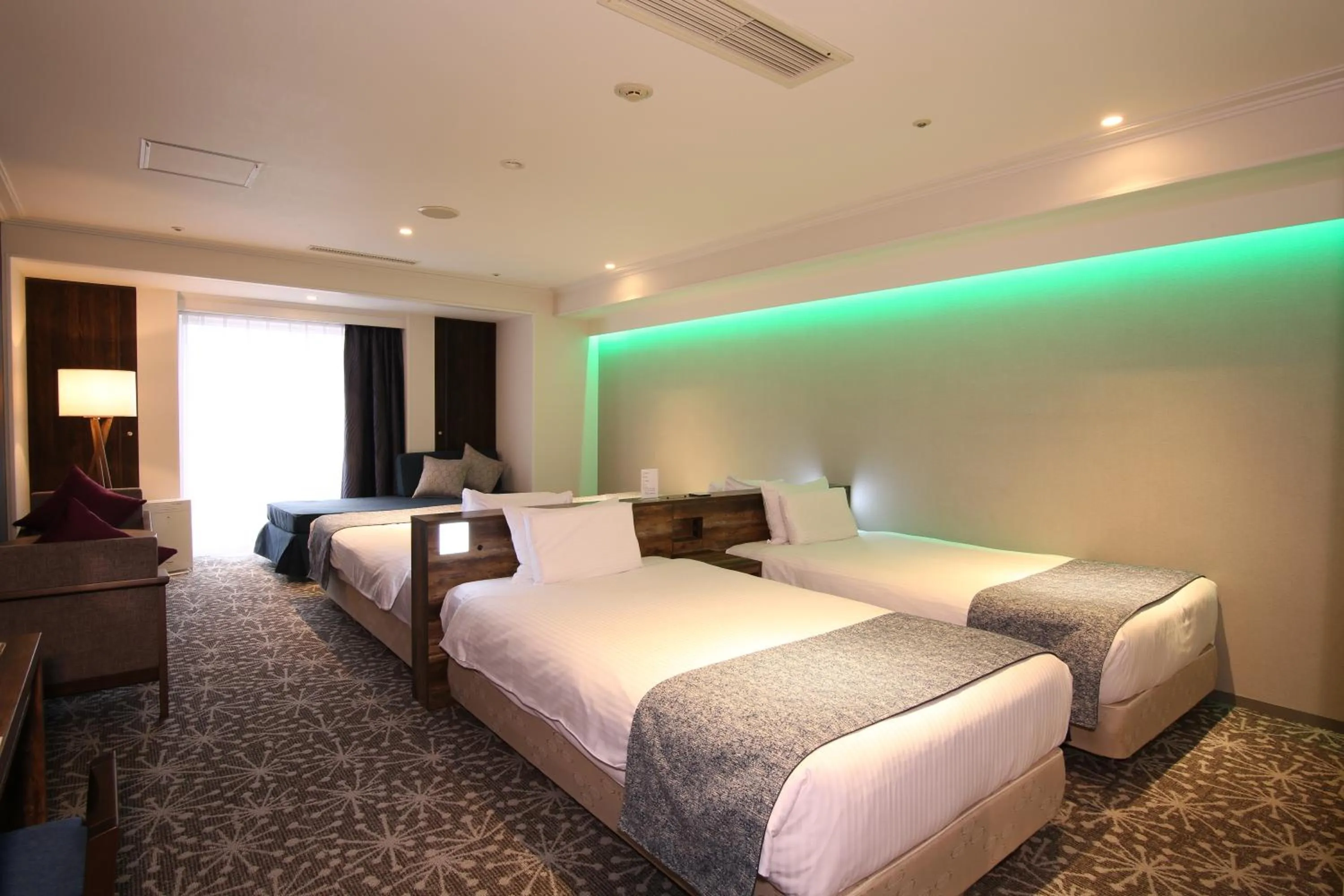 Photo of the whole room, Bed in Quintessa Hotel Sapporo