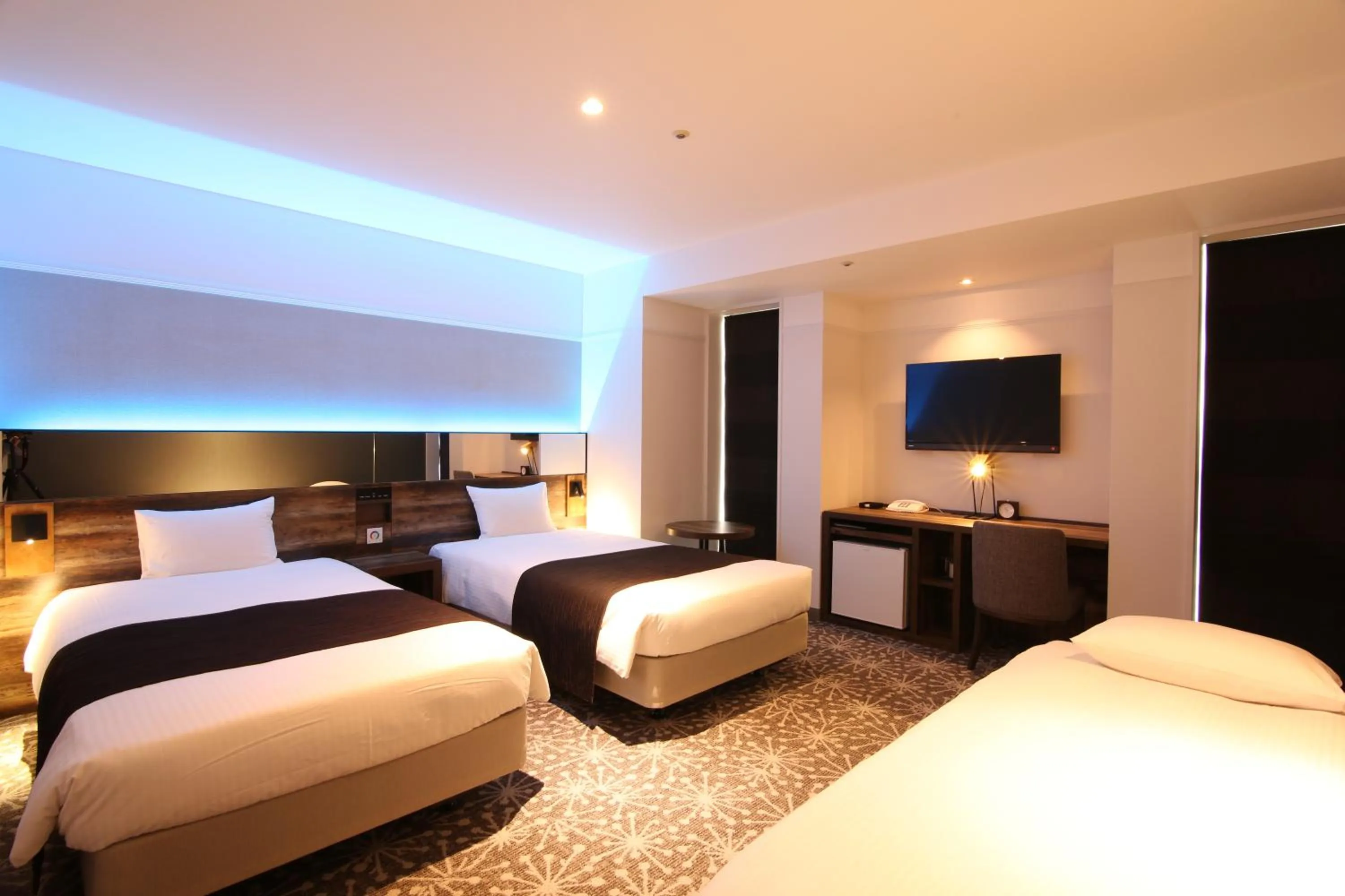 Photo of the whole room, Bed in Quintessa Hotel Sapporo